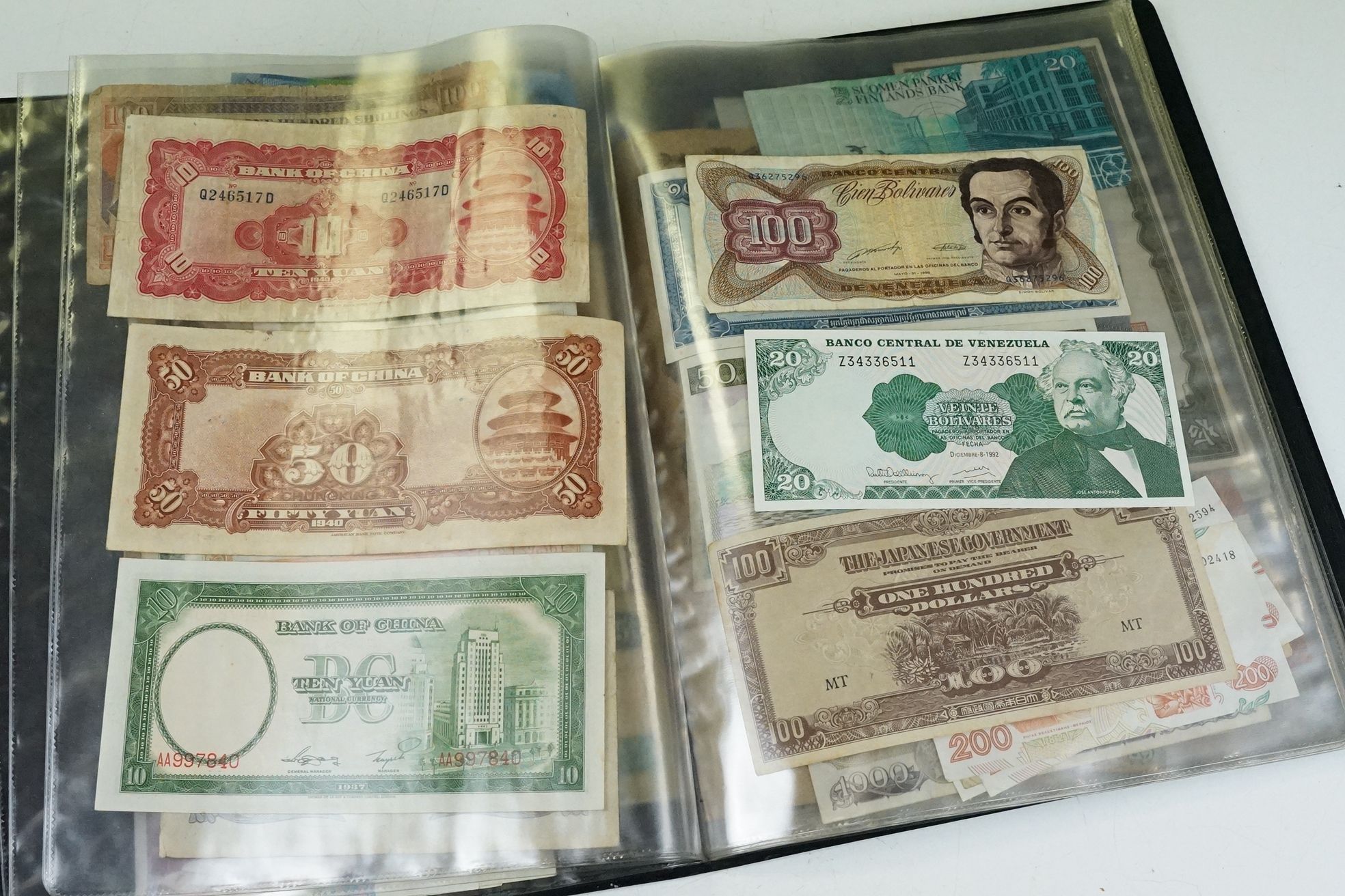 A collection of British and World banknotes contained within a folder to include China, Germany, - Image 5 of 19