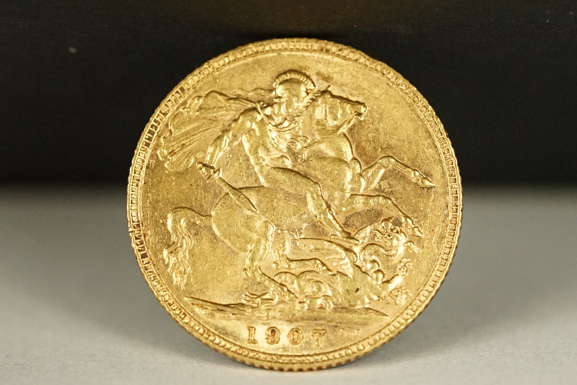 A British King Edward VII 1907 gold full sovereign coin.