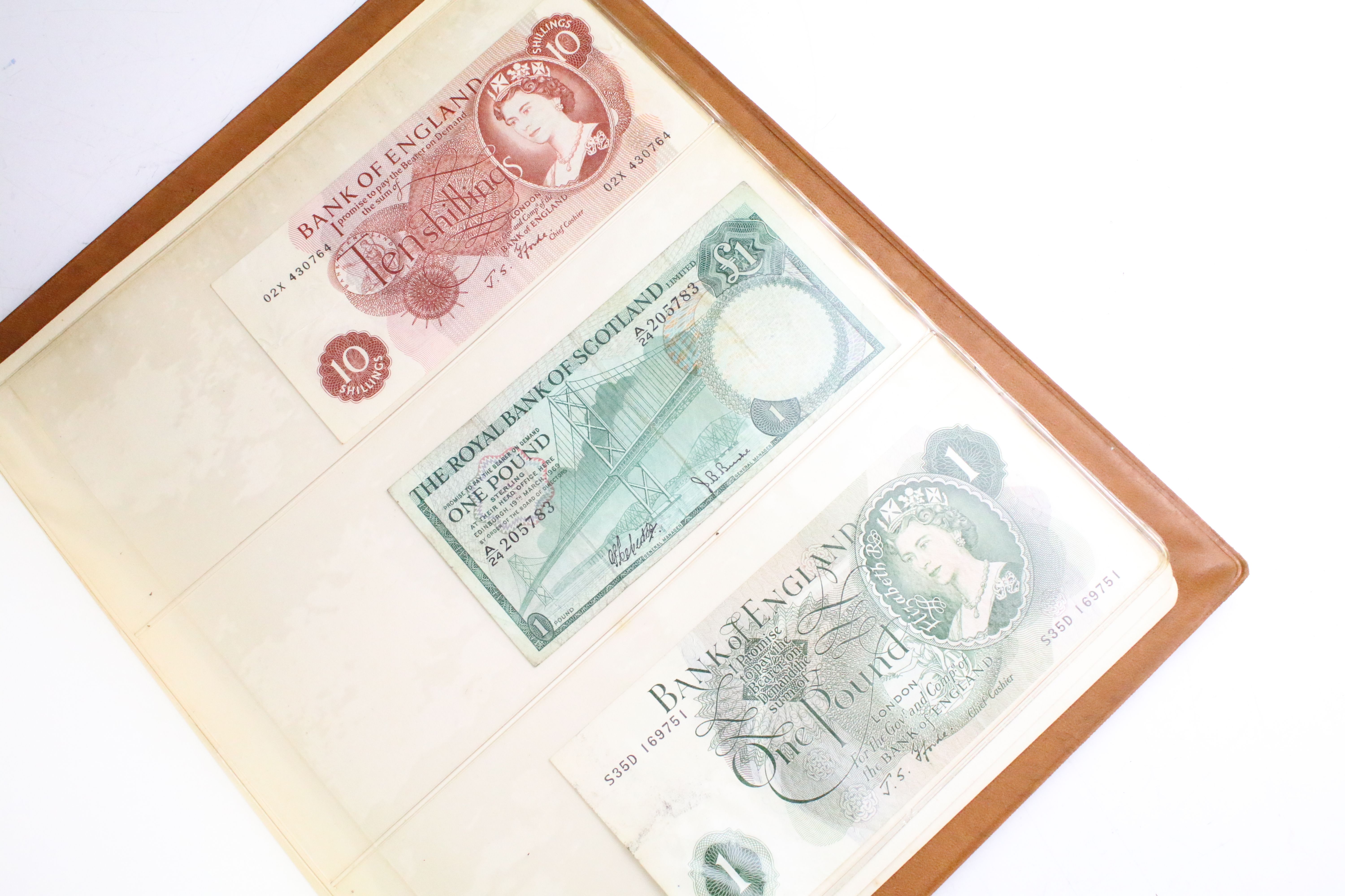 A small collection of British and World banknotes contained within a collectors album. - Image 8 of 9