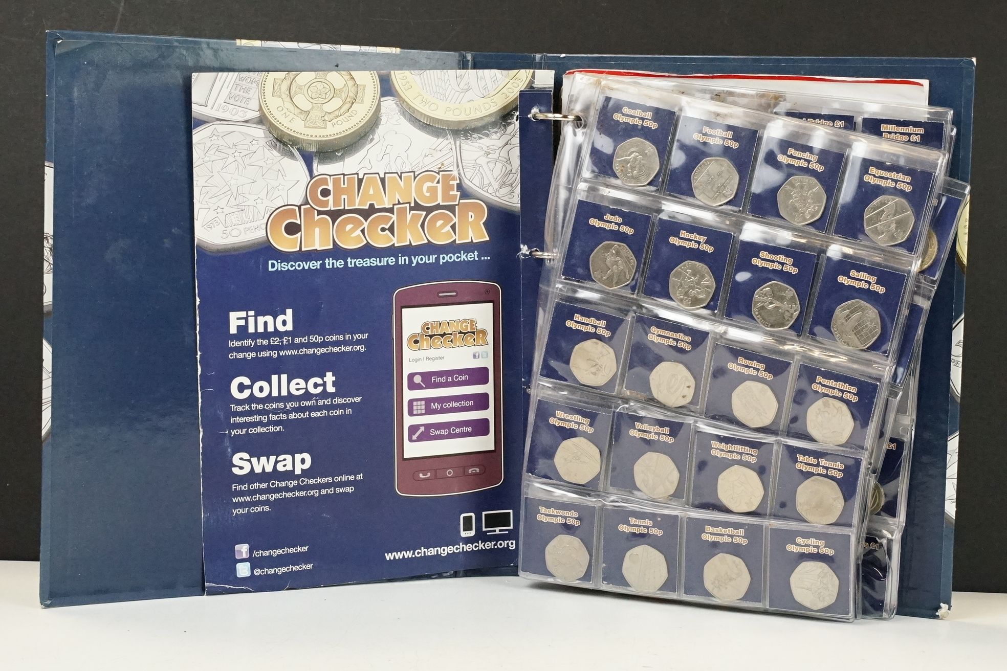 A collection of British decimal collectable £2, £1 and 50p coins contained within a change checker