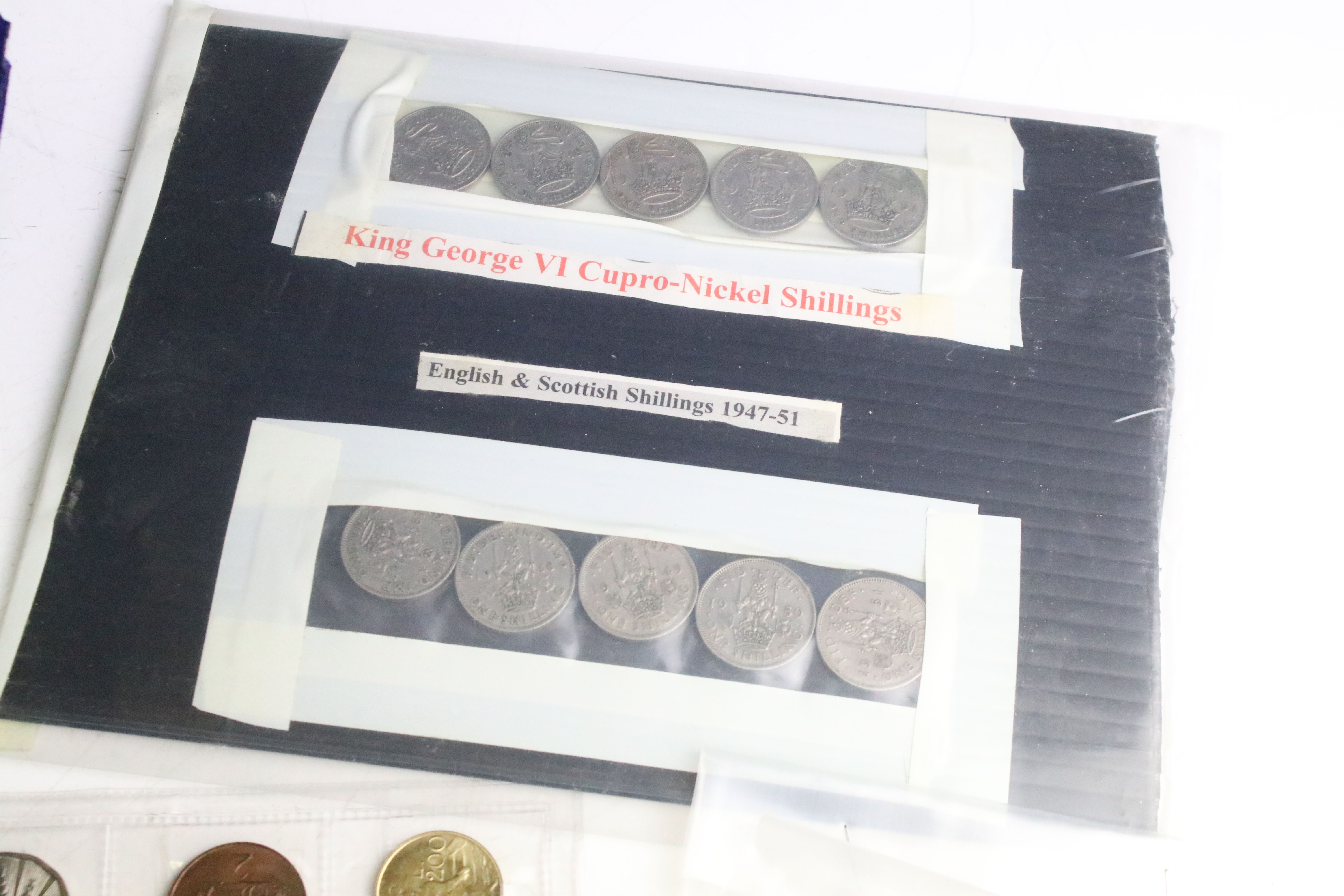 A collection of British pre decimal and World coins contained within an aluminium collectors case. - Image 8 of 11