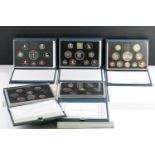 A collection of eight United Kingdom Royal Mint proof year sets to include 1992, 1998, 1989, 1988,