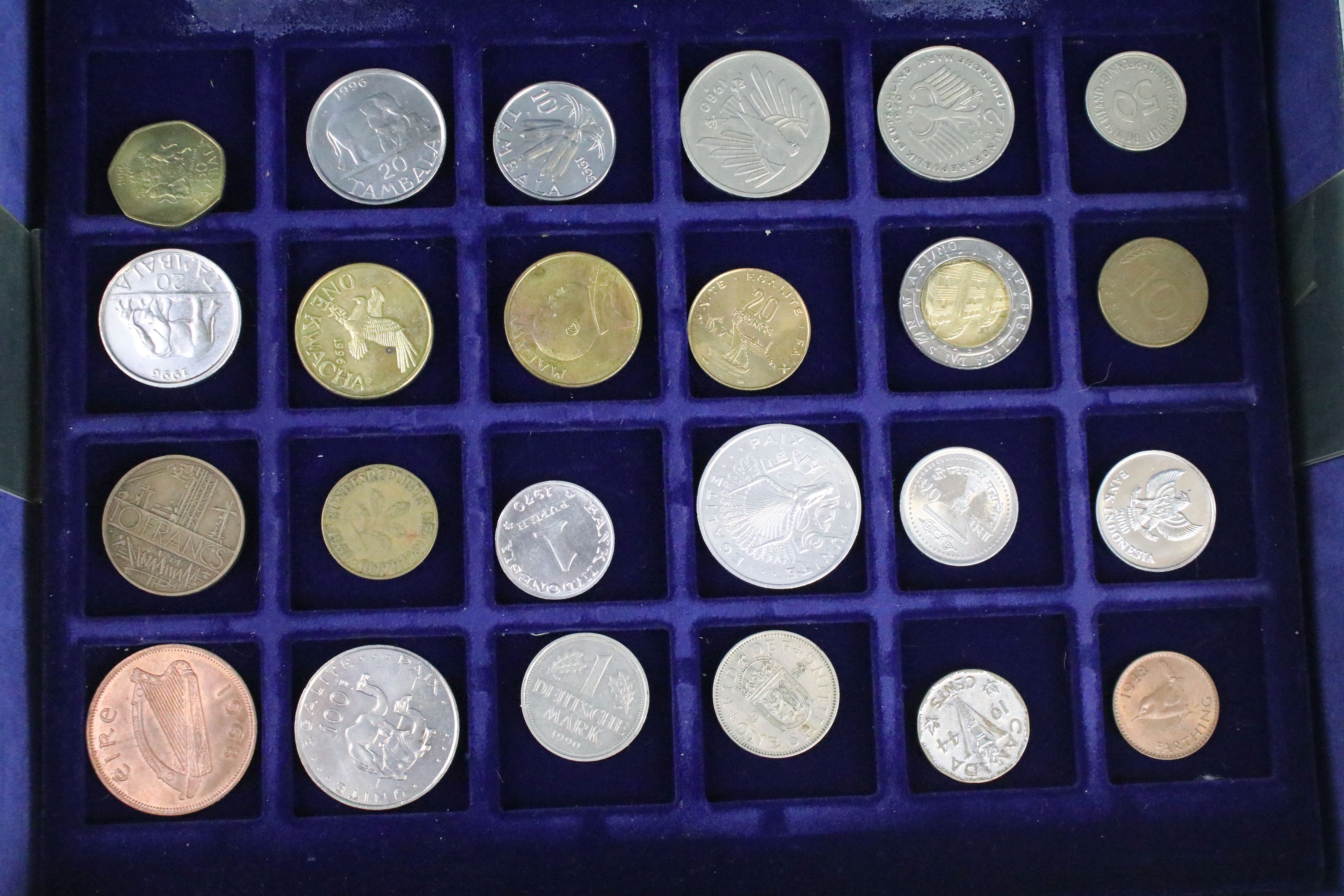 A collection of British pre decimal and World coins contained within an aluminium collectors case. - Image 11 of 11