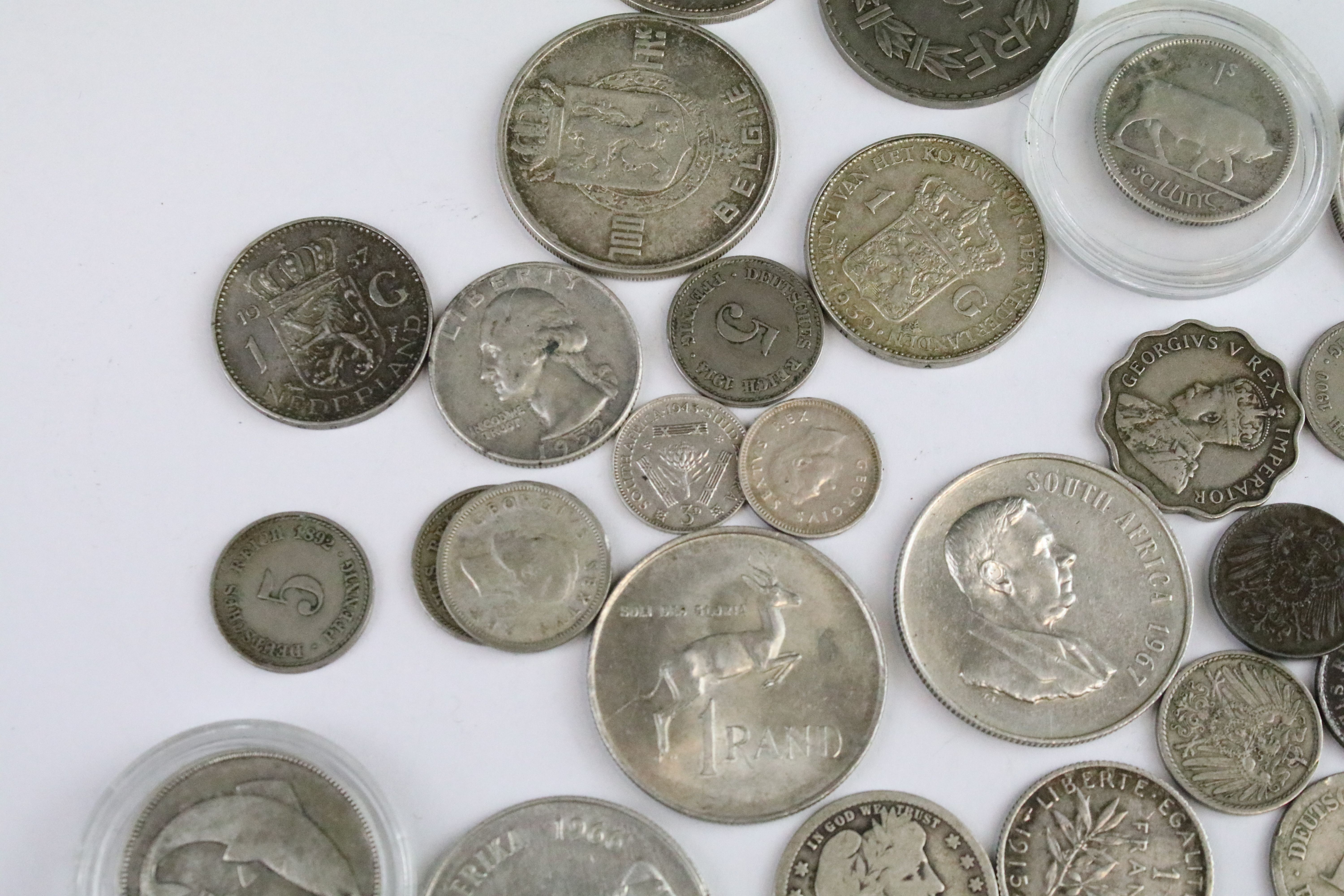 A collection of circulated world silver coins to include United States, German and India examples. - Image 7 of 9