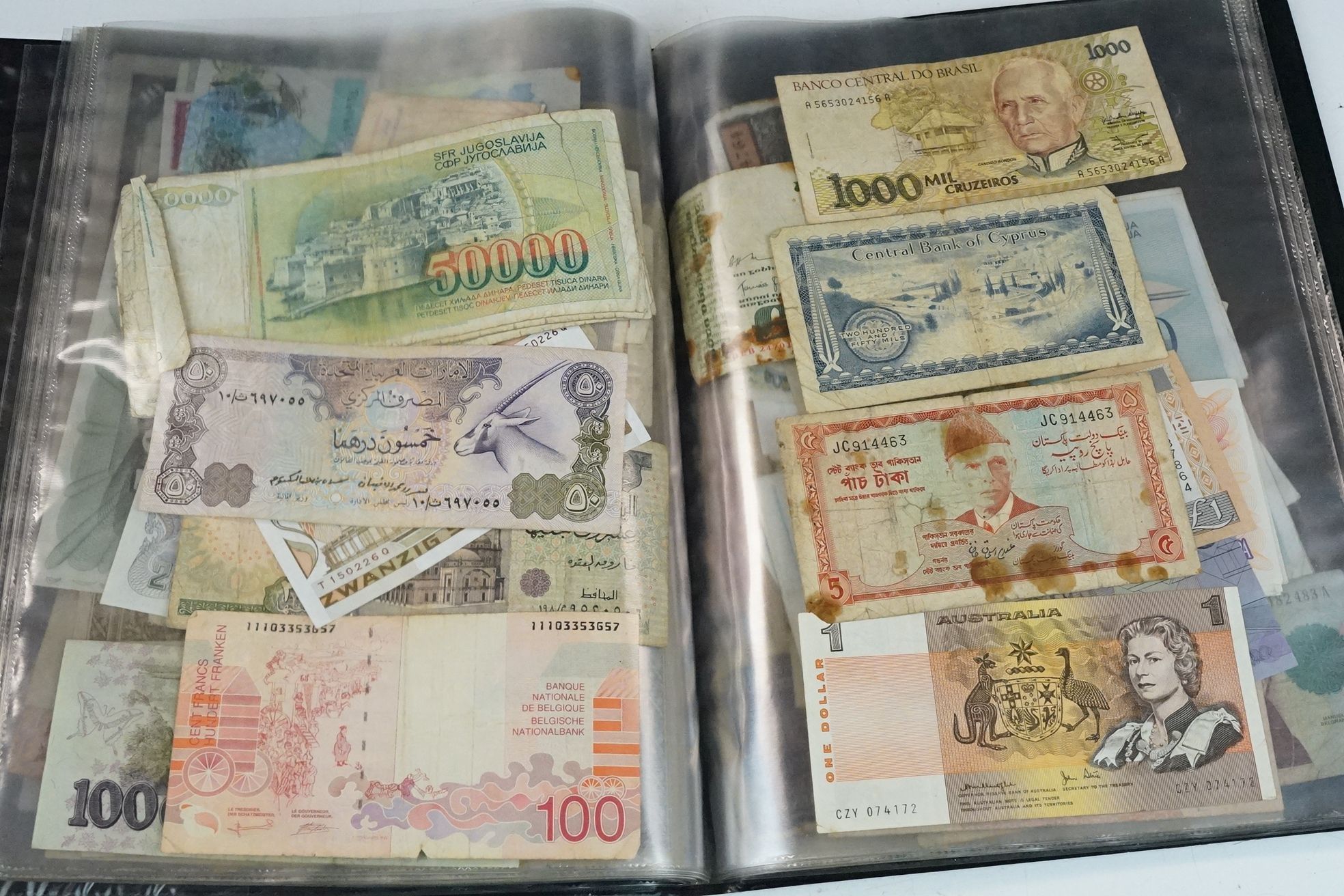 A collection of British and World banknotes contained within a folder to include China, Germany, - Bild 14 aus 19