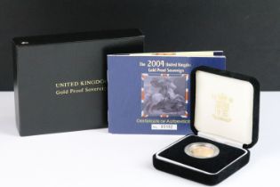 A British Royal Mint Queen Elizabeth II proof 2004 gold full sovereign coin encapsulated within