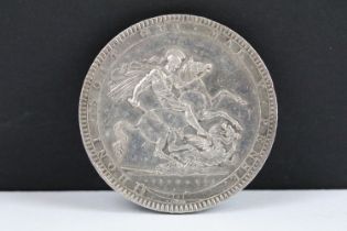A British King George III 1819 silver crown coin.