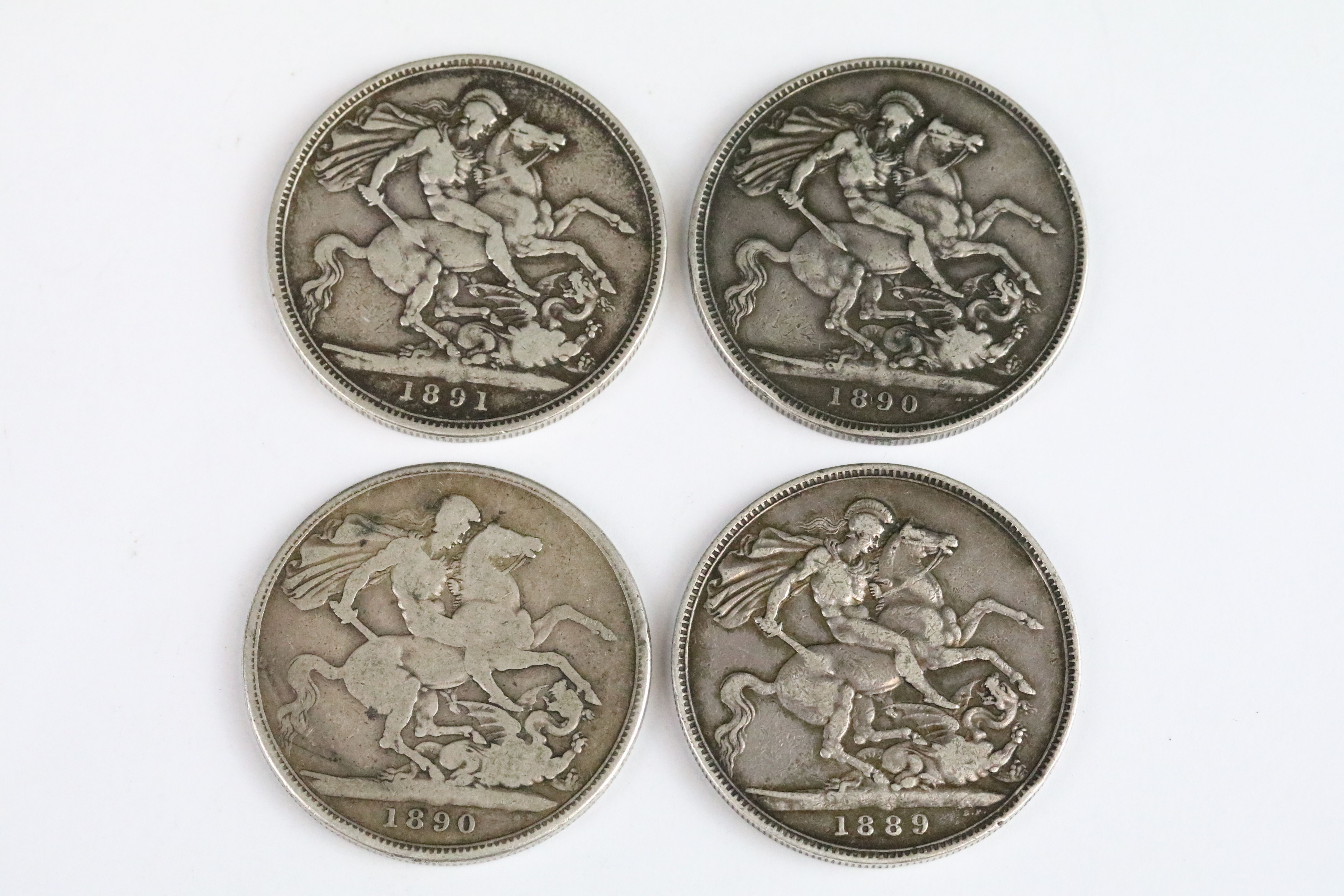 A collection of four British Queen Victoria pre decimal silver full crown coins to include 1889, - Image 2 of 3