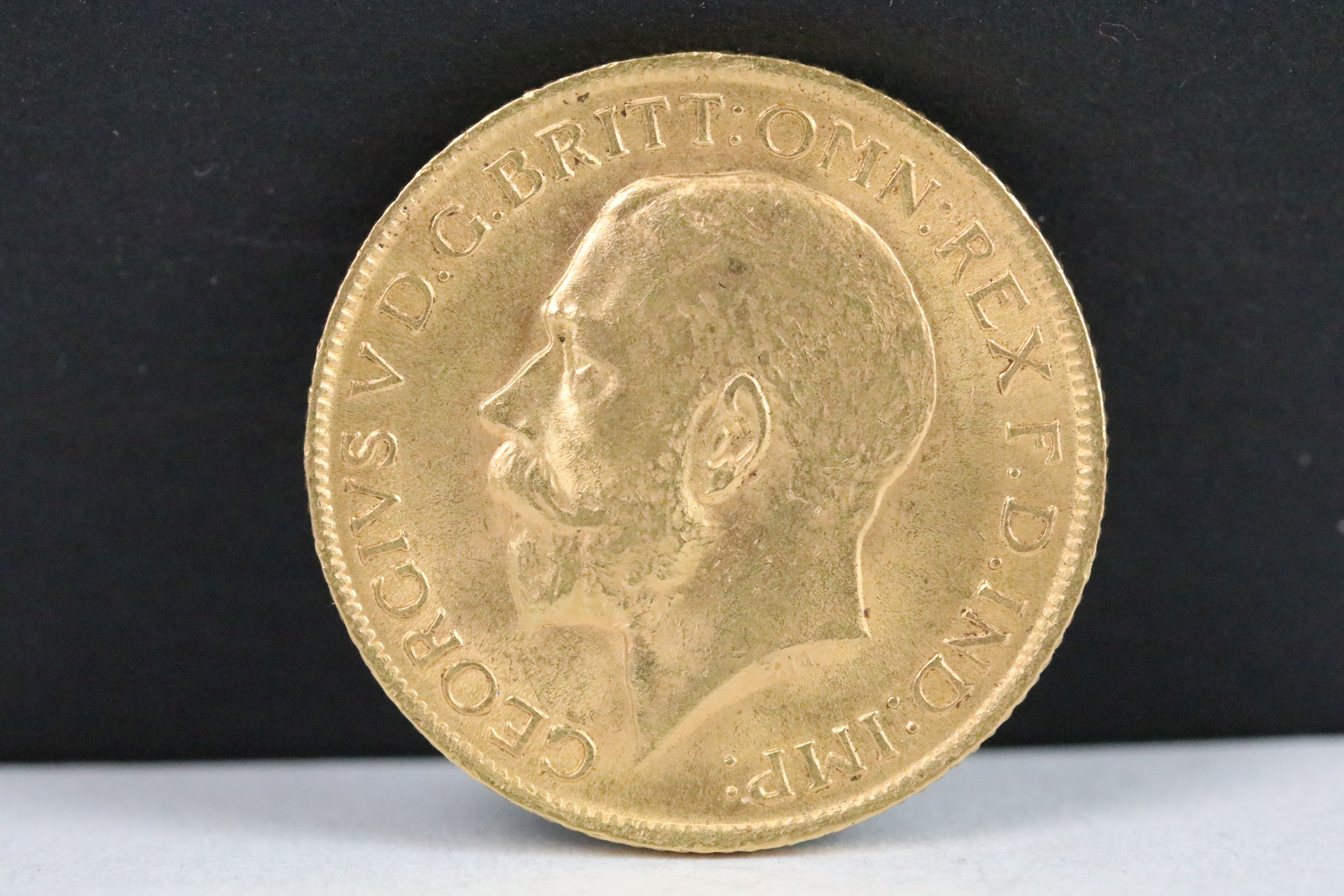 A British King George V 1912 gold full sovereign coin. - Image 2 of 3