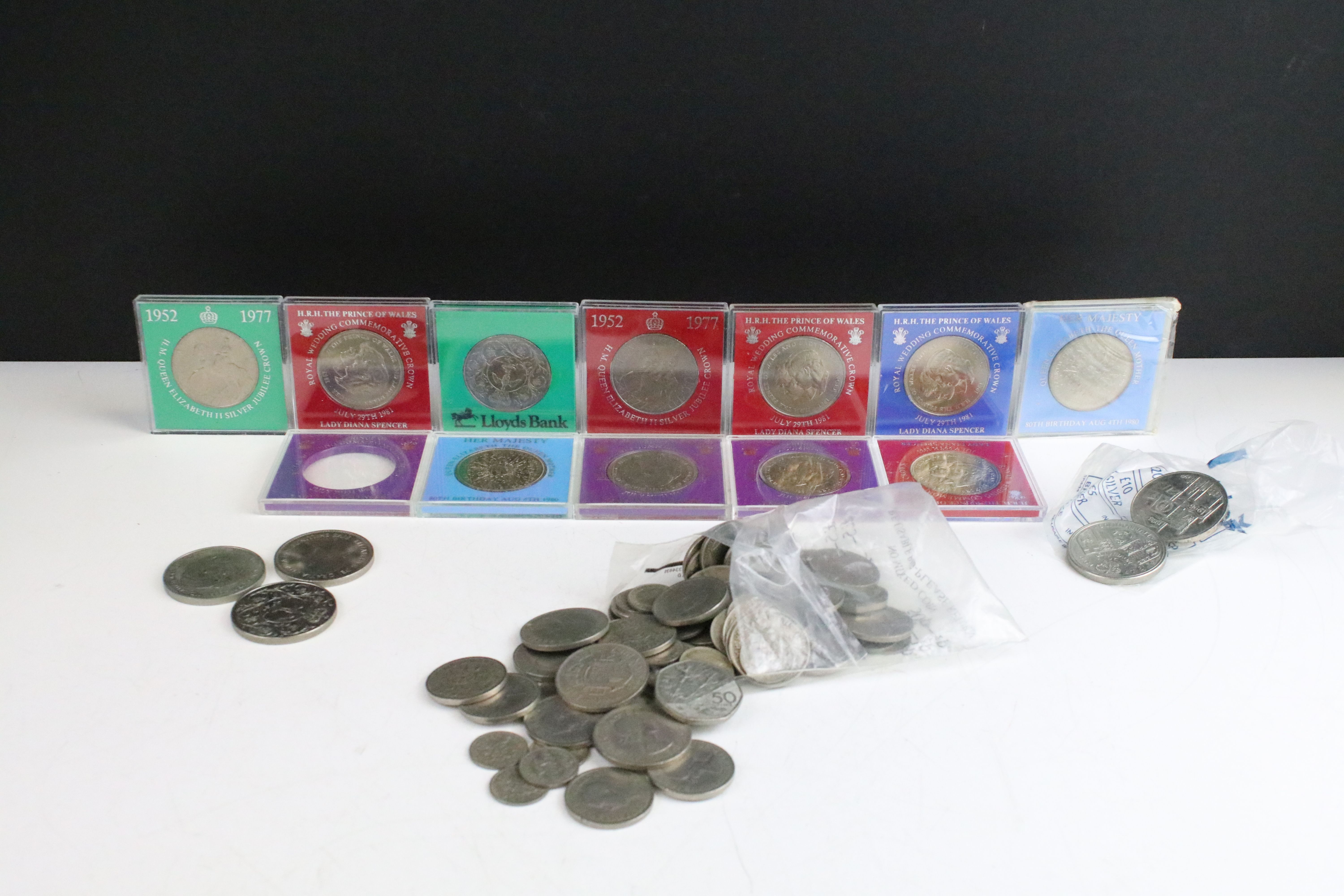 A small collection of British uncirculated commemorative crowns together with a selection of pre