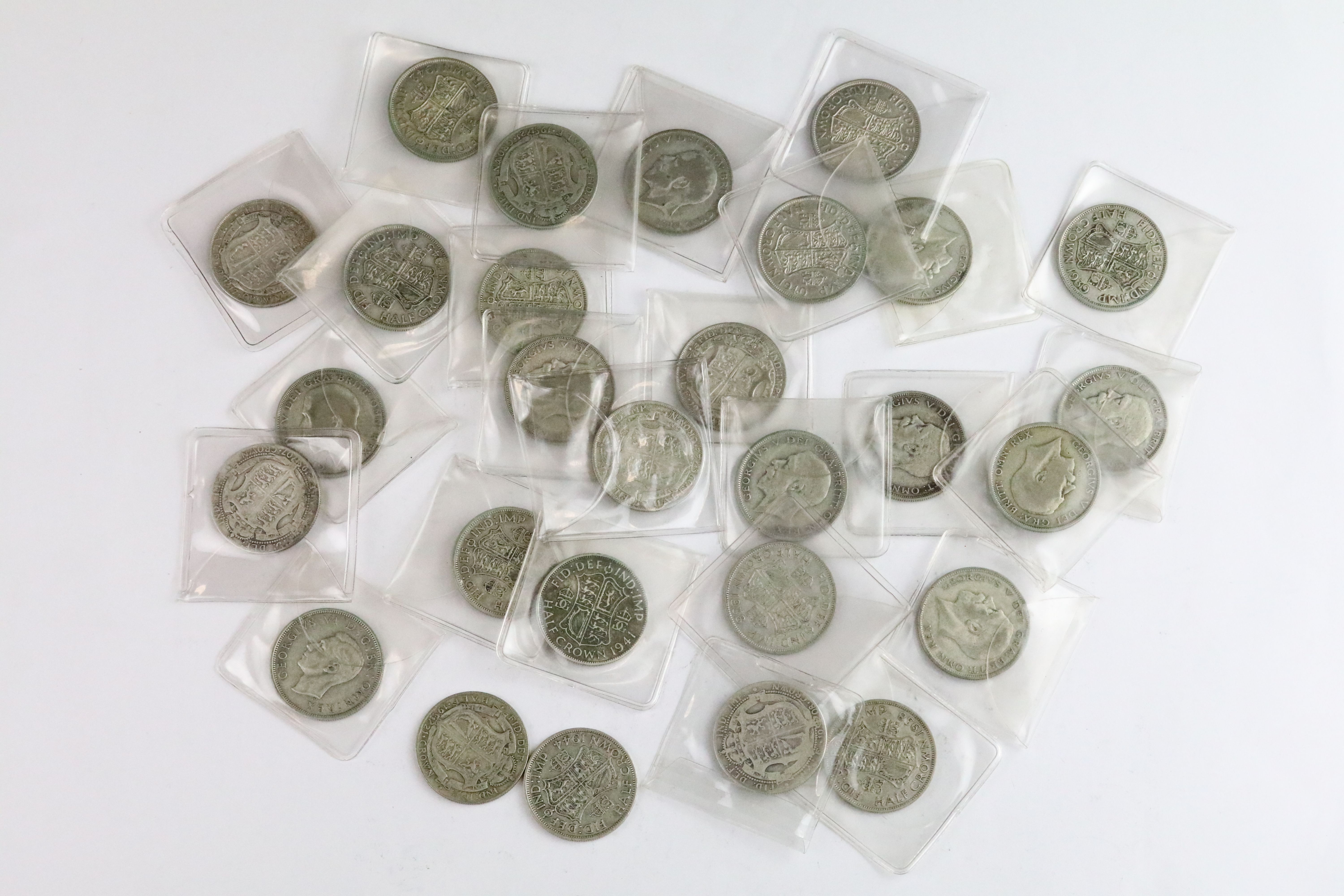A collection of approx twenty eight British pre decimal pre 1947 and pre 1920 silver crown coins.
