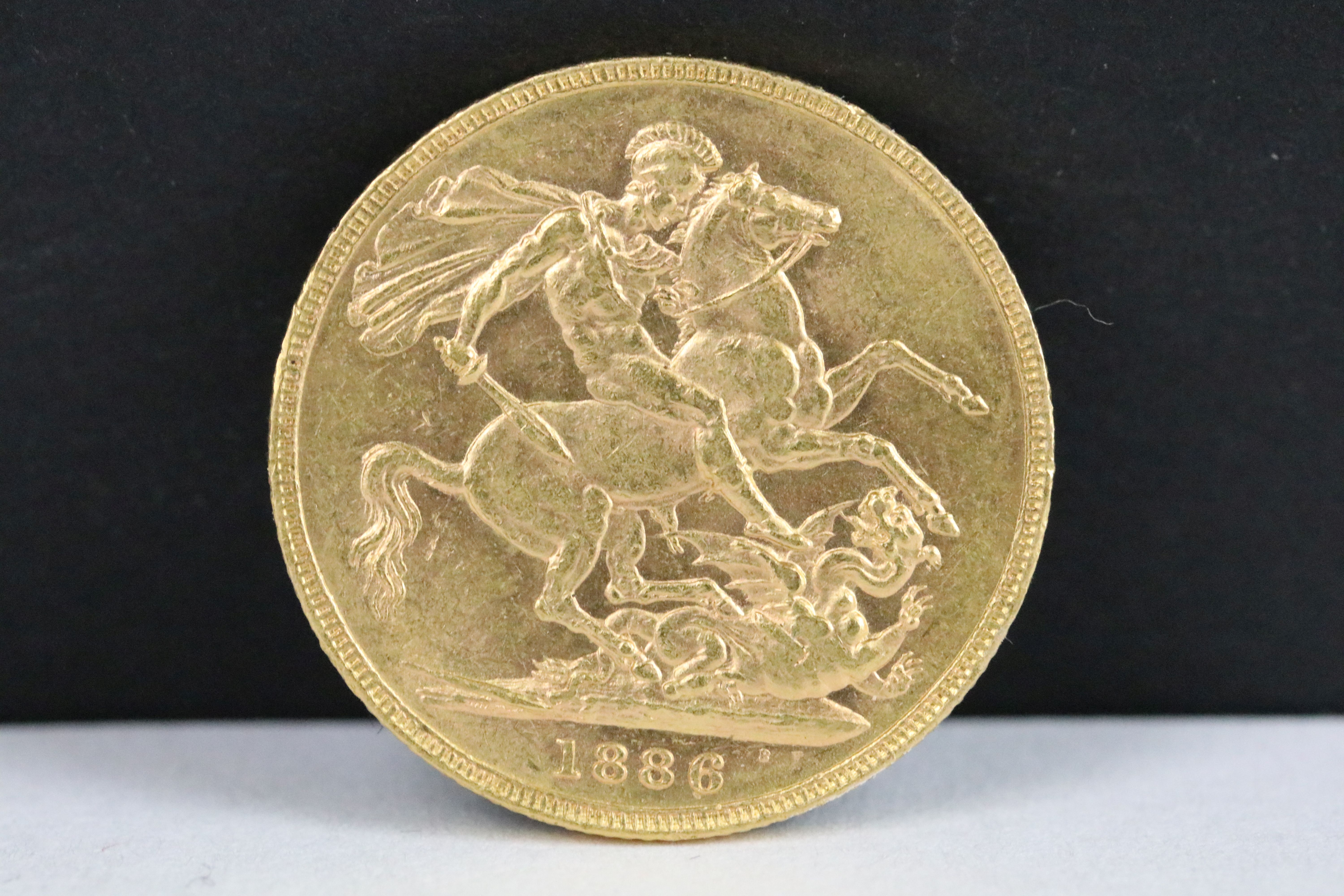 A British Queen Victoria 1886 gold full sovereign coin.