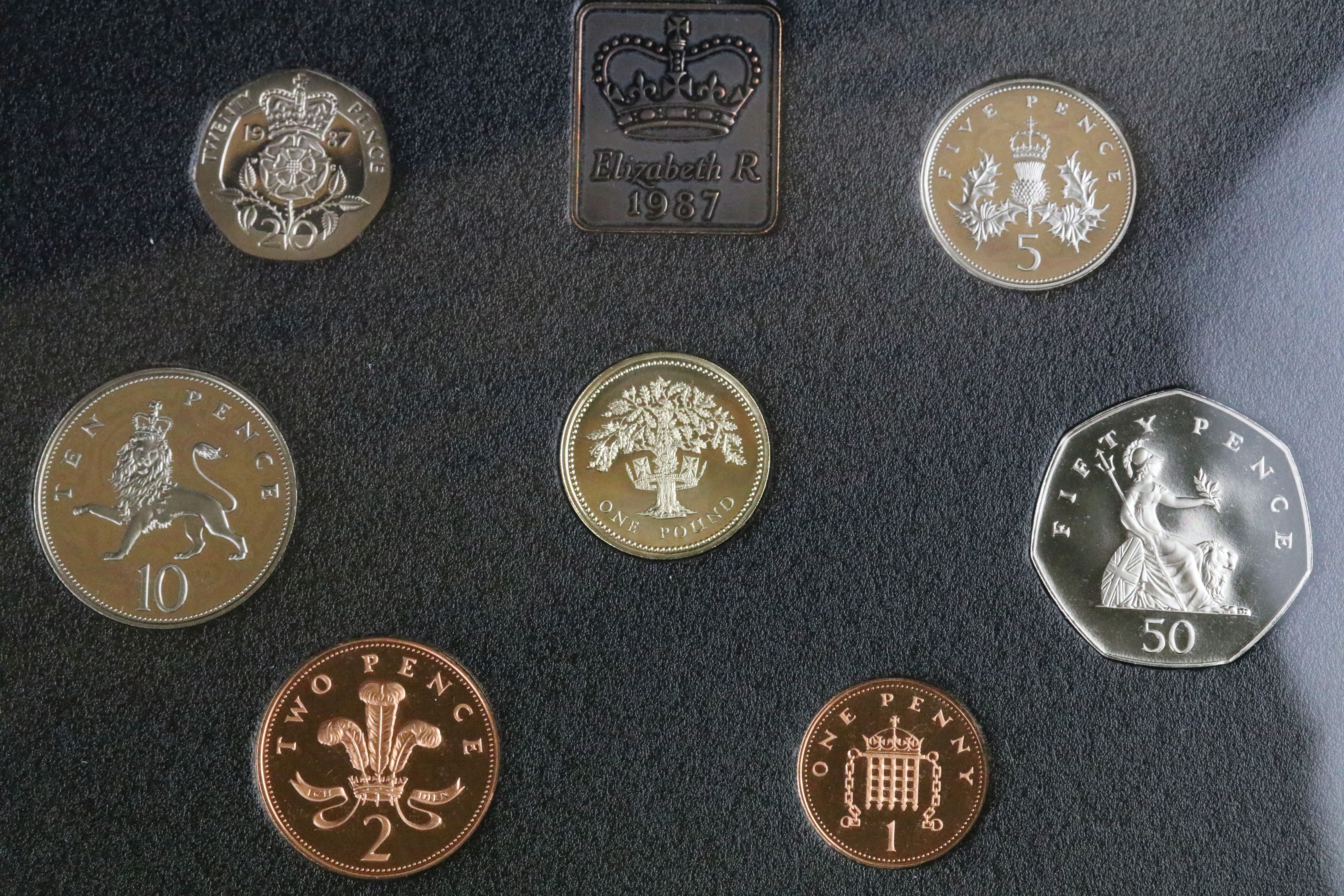 A collection of eight United Kingdom Royal Mint proof year sets to include 1984, 1993, 1991, 1997. - Image 8 of 9