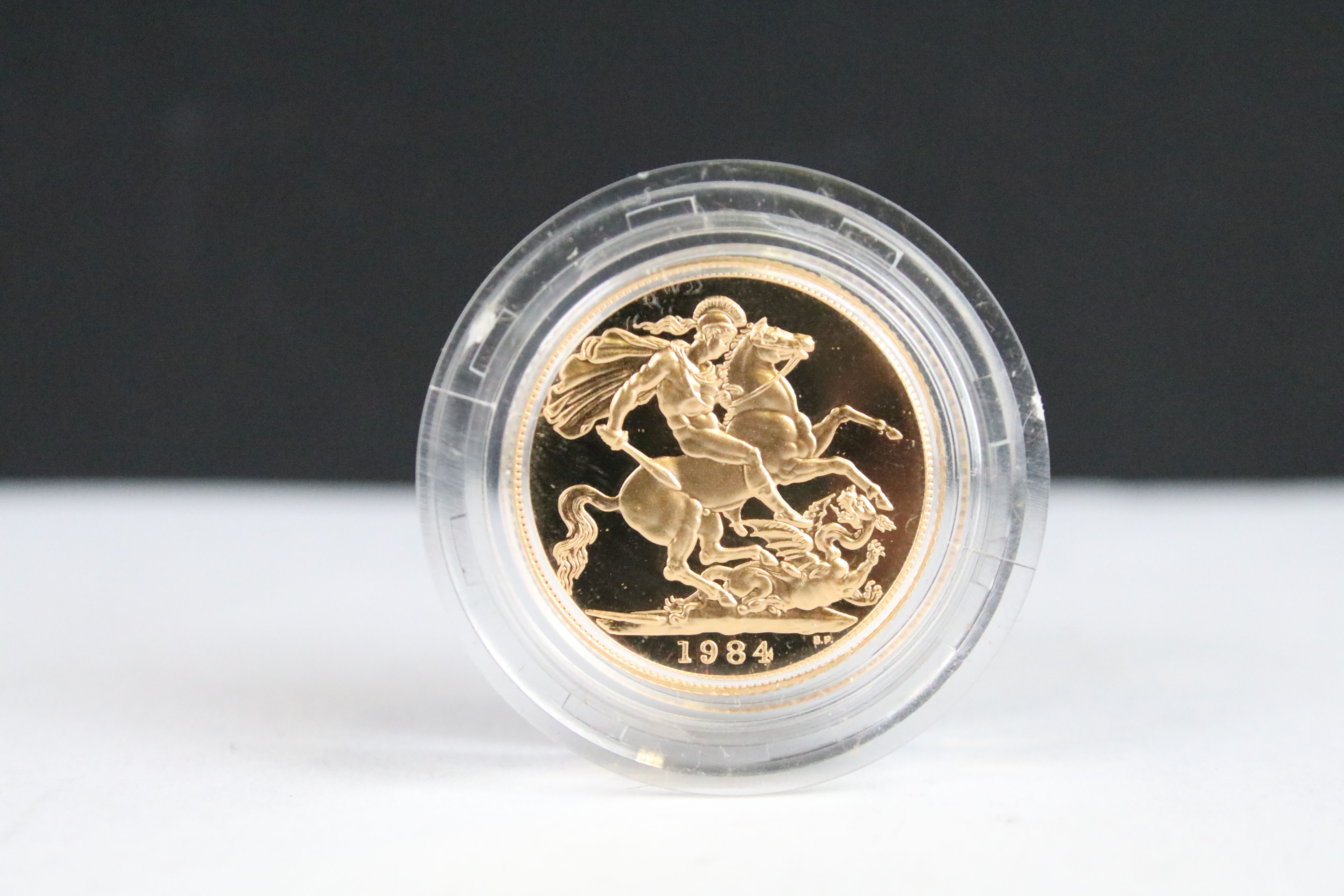 A British Royal Mint Queen Elizabeth II proof 1984 gold full sovereign coin encapsulated within - Image 2 of 4