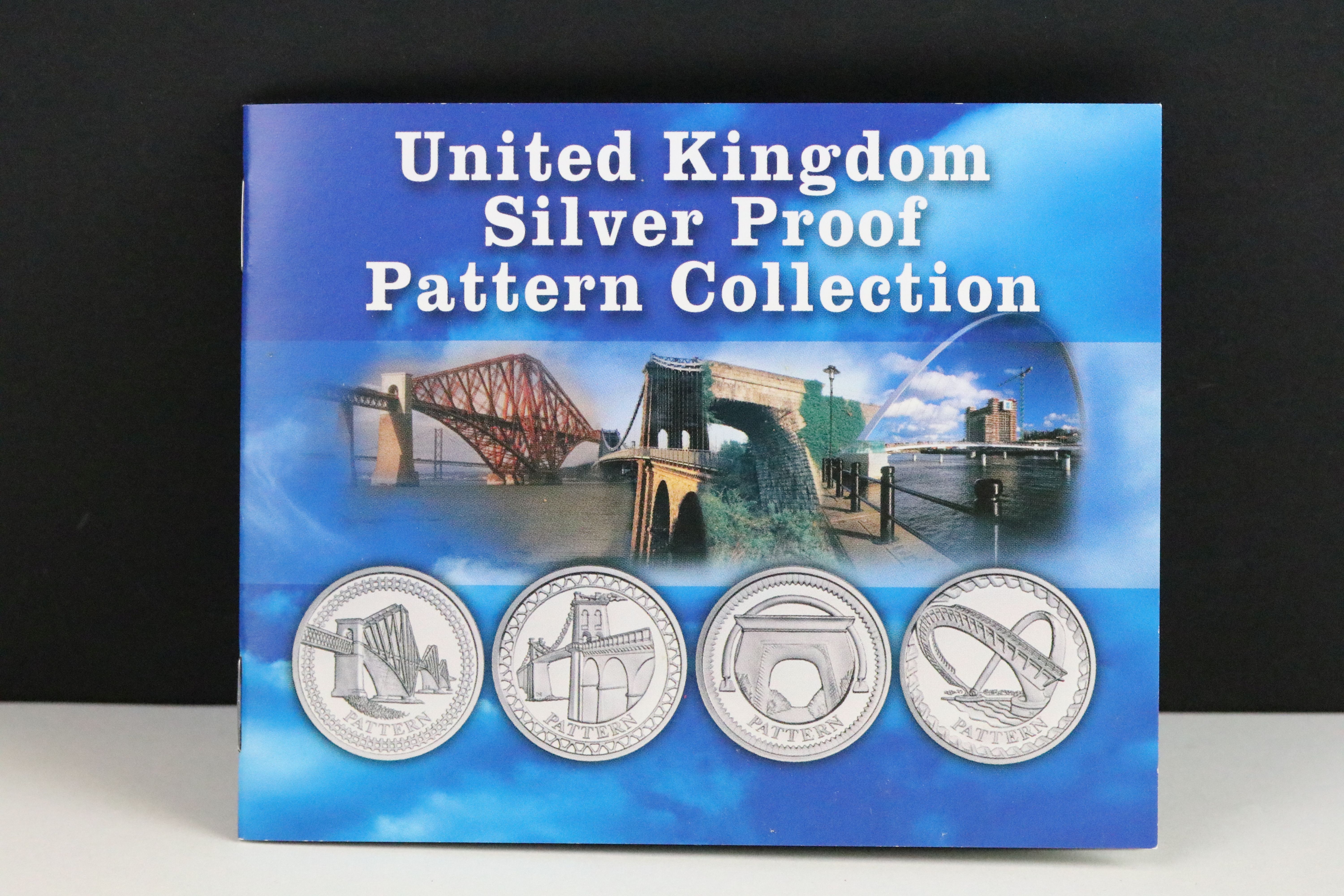 A Royal Mint United Kingdom silver proof £1 four coin pattern collection encapsulted within fitted - Image 6 of 6