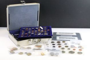 A collection of British pre decimal and World coins contained within an aluminium collectors case.