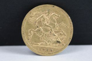 A British Queen Victoria 1896 gold half sovereign coin.