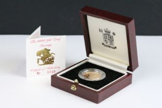 A British Royal Mint Queen Elizabeth II proof 1991 gold full sovereign coin encapsulated within