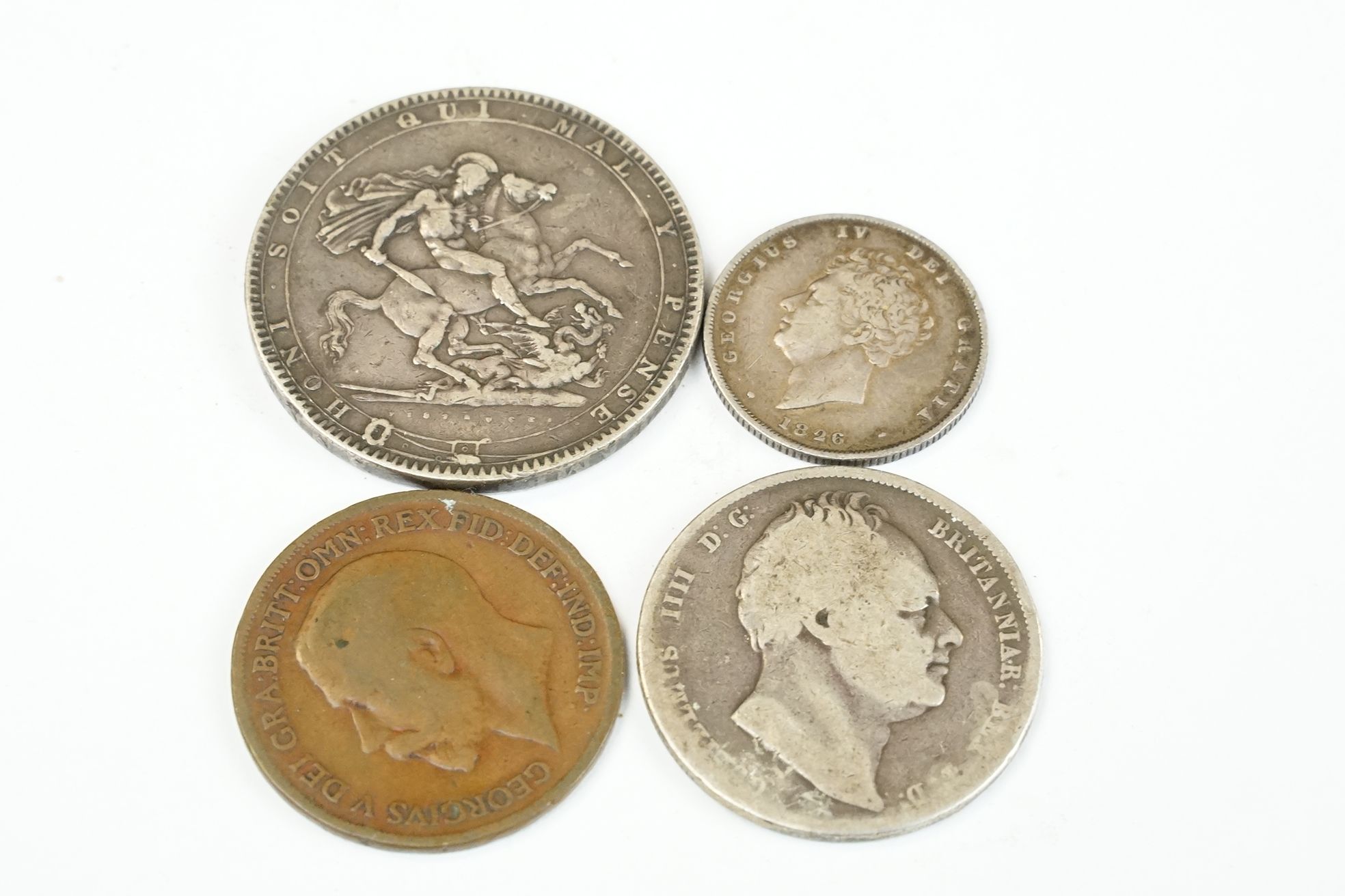 A small group of four British pre decimal coins to include a King George III 1819 full silver - Bild 2 aus 3