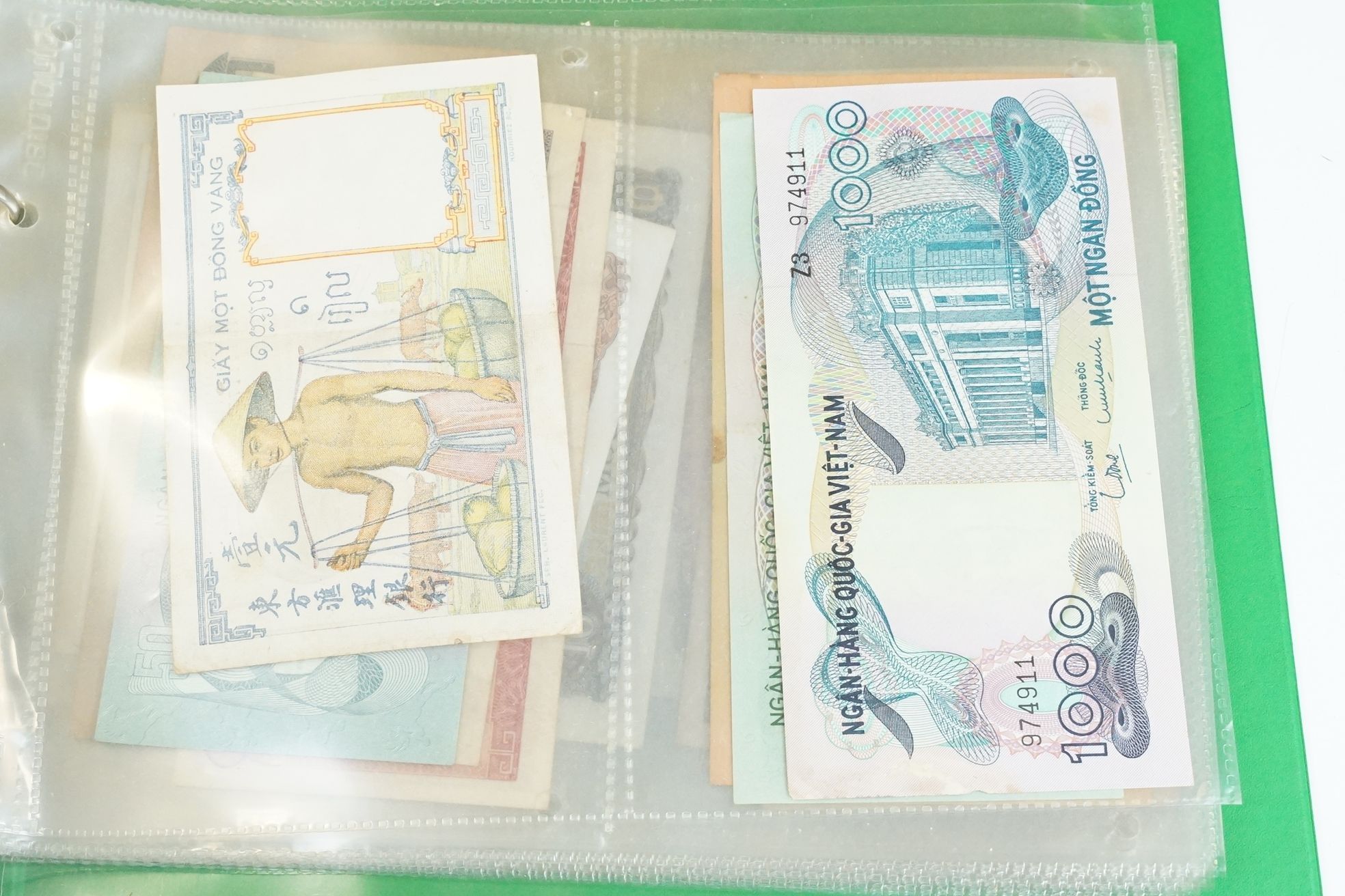 A large collection of British and world banknotes contained within two folders to include a - Image 16 of 20