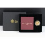 A British Royal Mint Queen Elizabeth II proof 2015 gold full sovereign coin encapsulated within