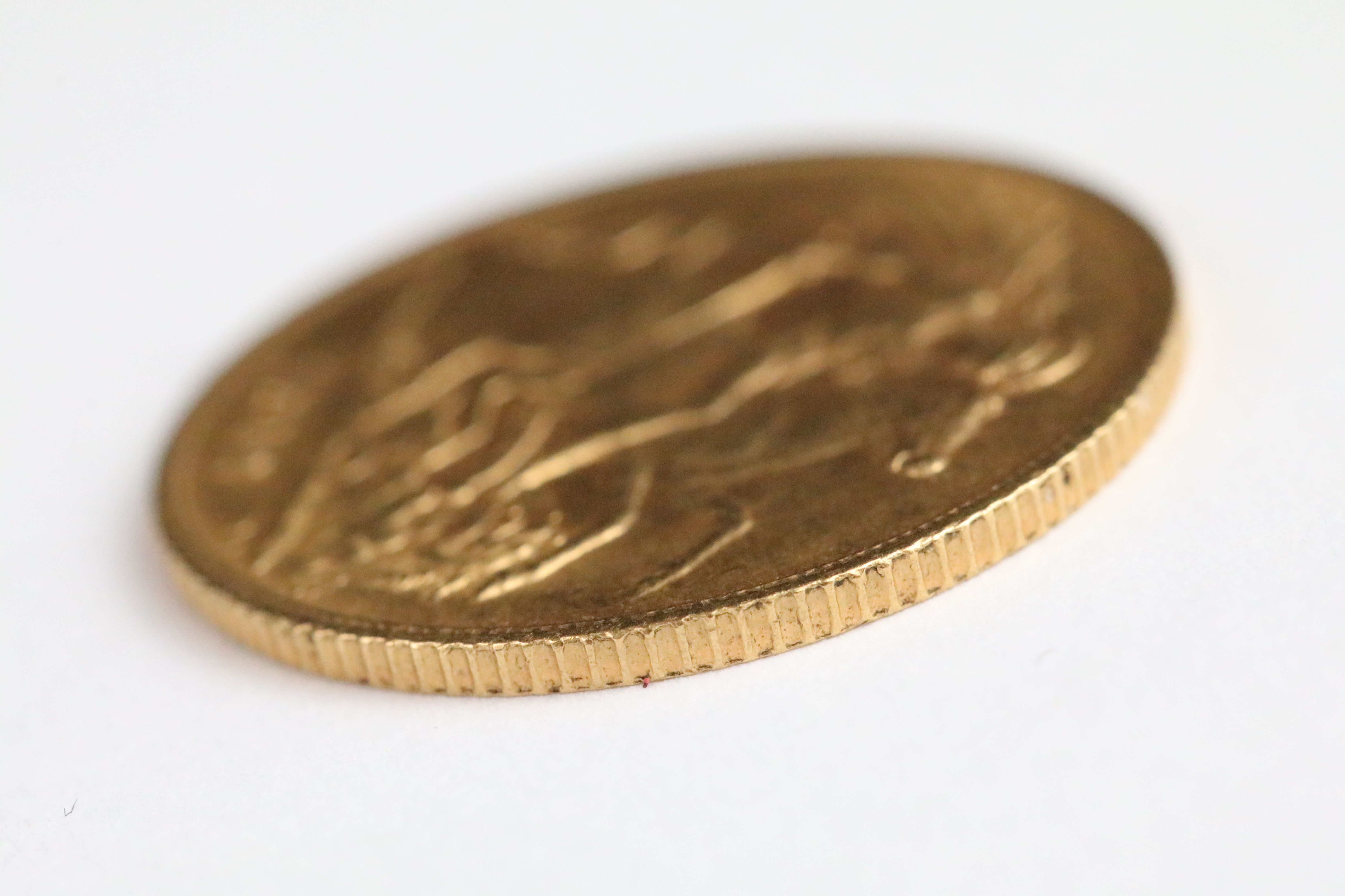 A British King George V 1912 gold half sovereign coin. - Bild 3 aus 3