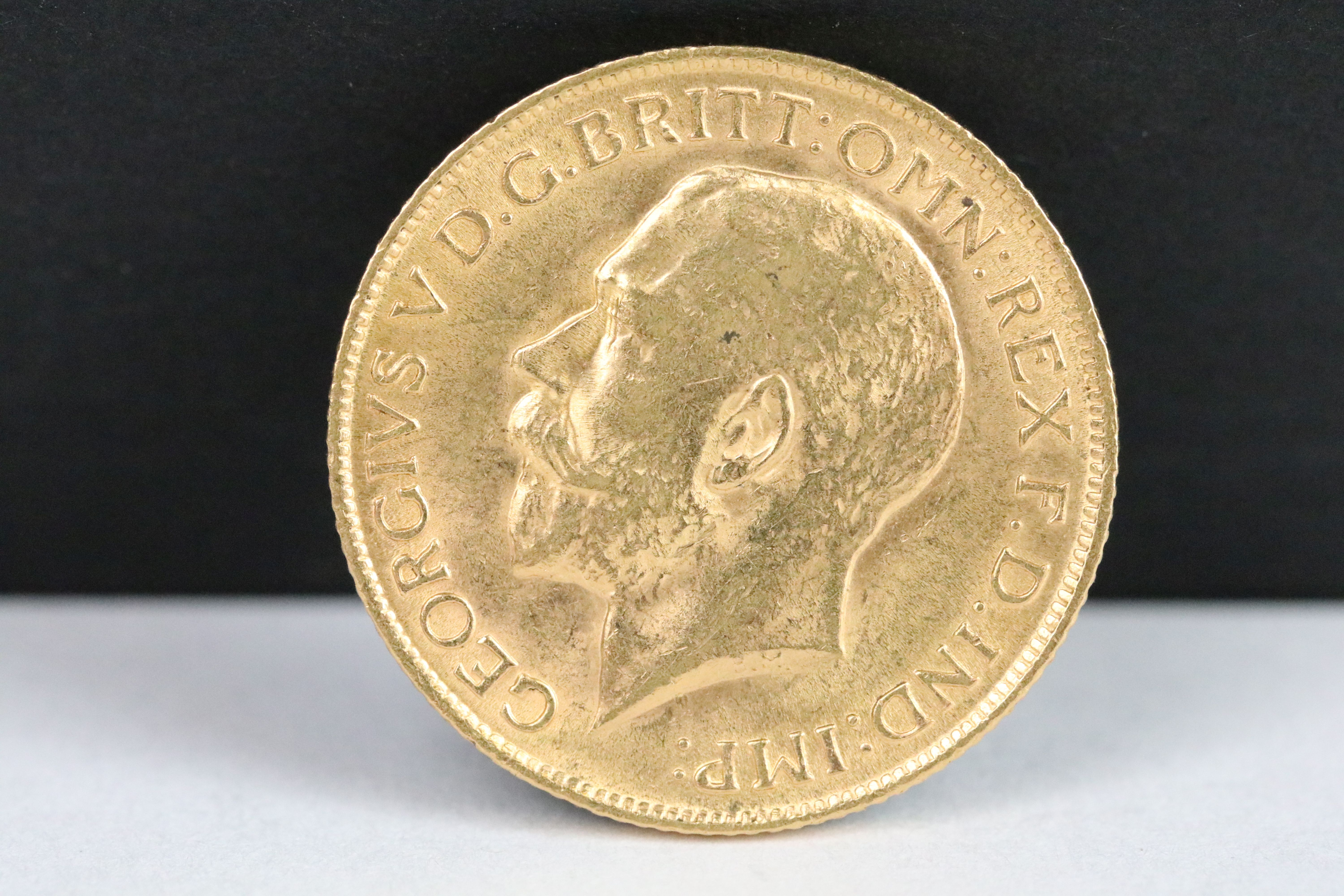 A British King George V 1911 gold full sovereign coin. - Image 2 of 3
