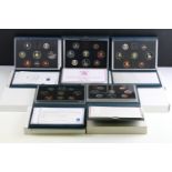 A collection of eight United Kingdom Royal Mint proof year sets to include 1984, 1993, 1991, 1997.