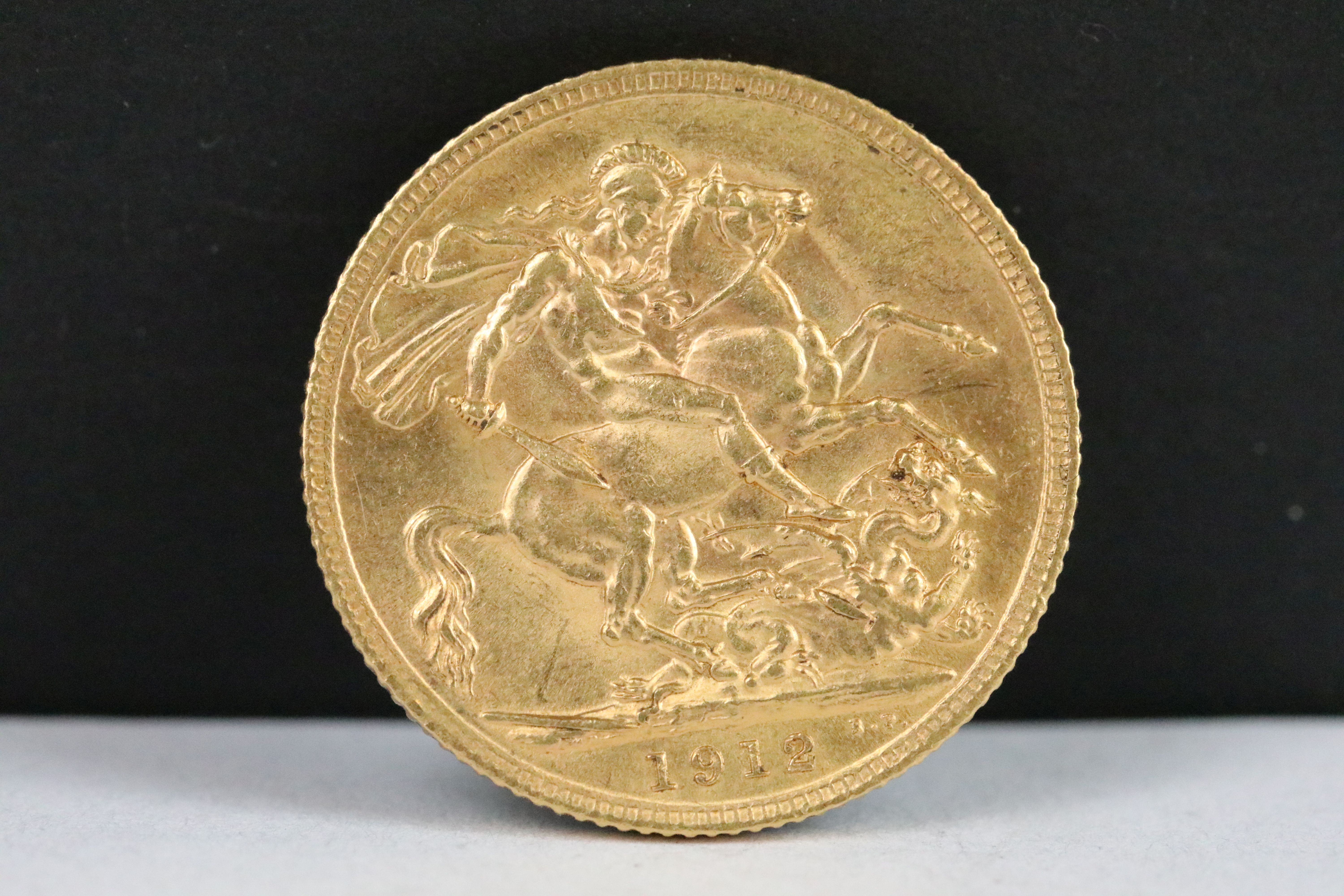 A British King George V 1912 gold full sovereign coin.