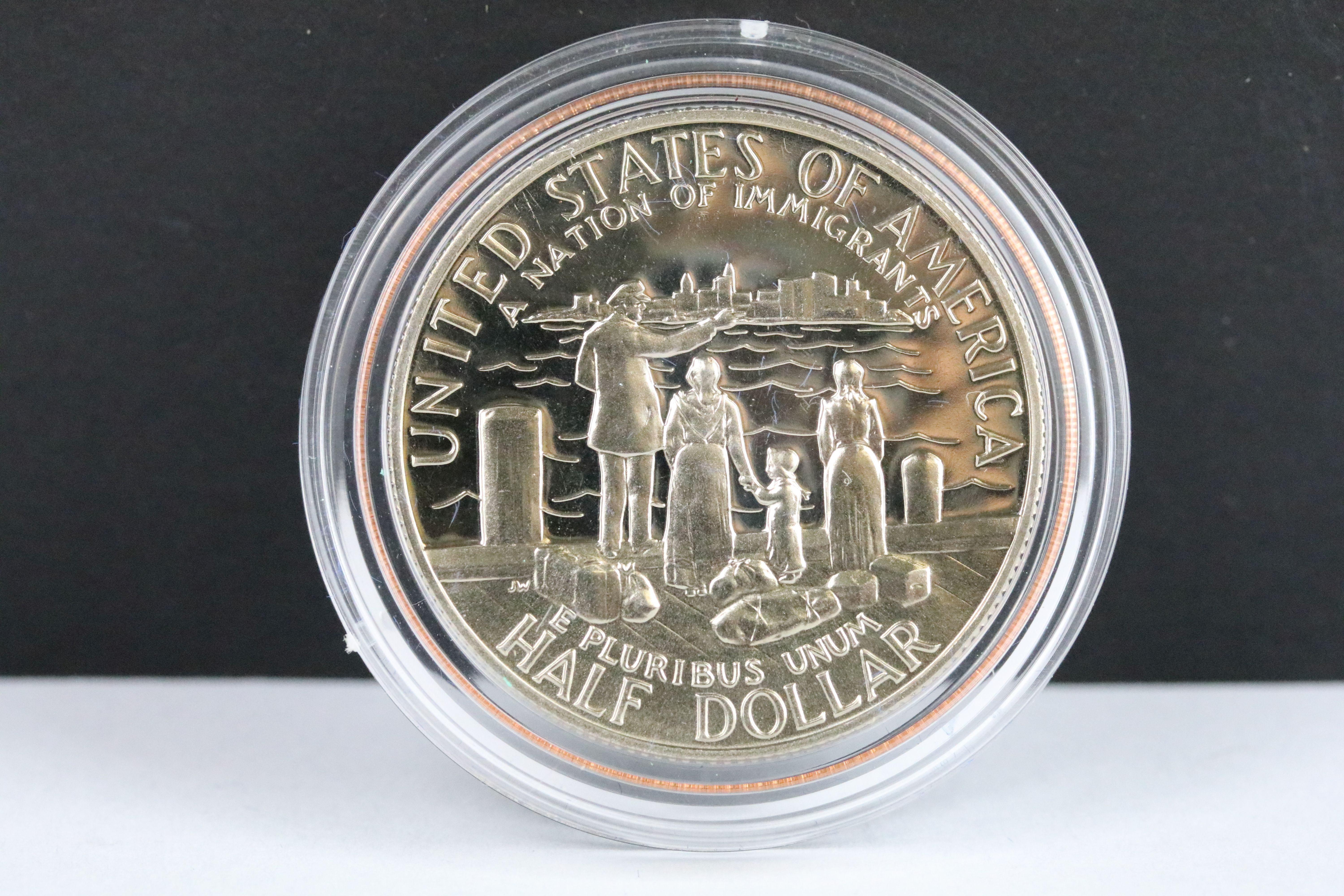 A cased United States of America Liberty coin set comprising of the 1986 silver dollar and half - Image 5 of 6