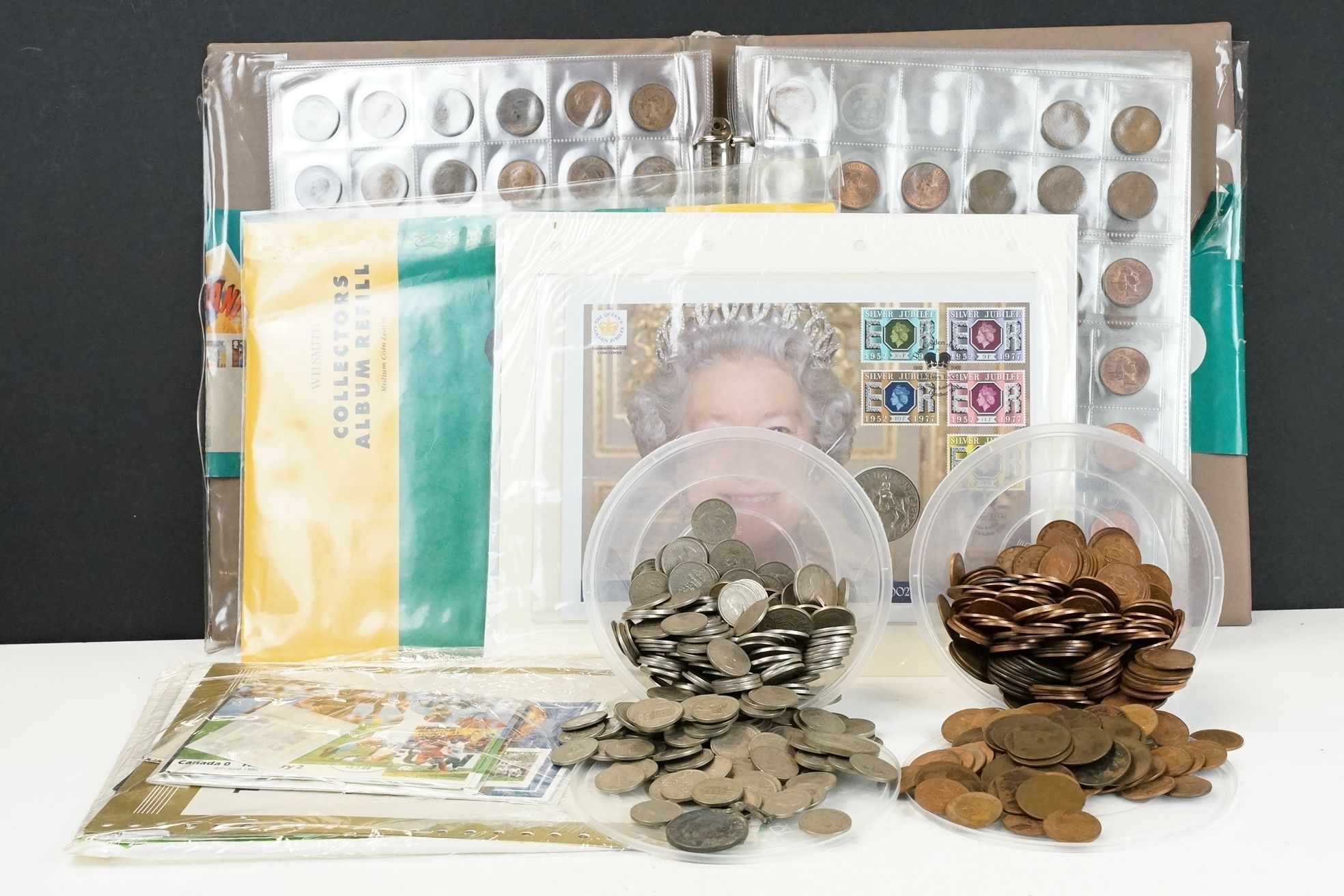 A good collection of mainly British pre decimal coins within a collectors album together with