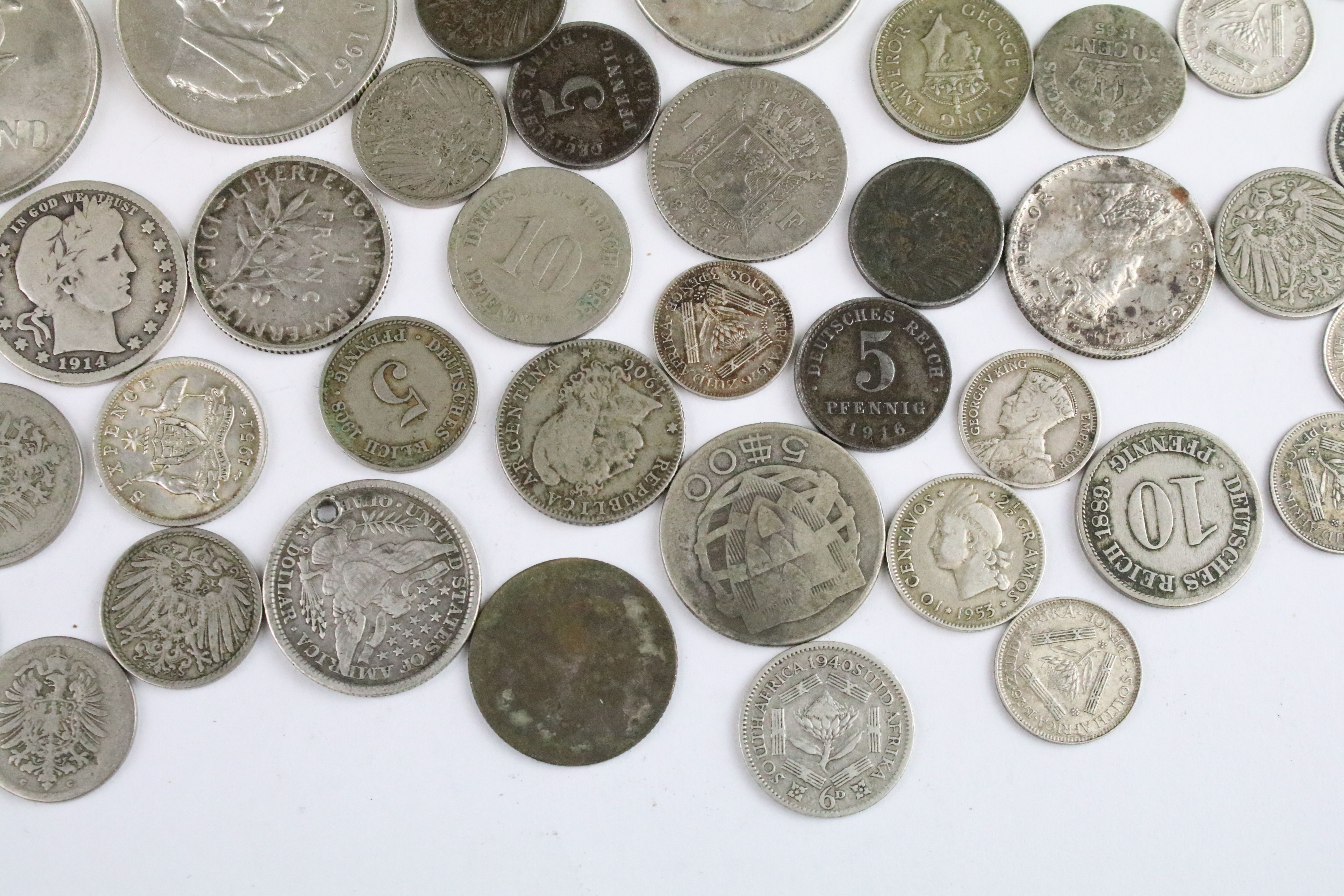 A collection of circulated world silver coins to include United States, German and India examples. - Image 3 of 9