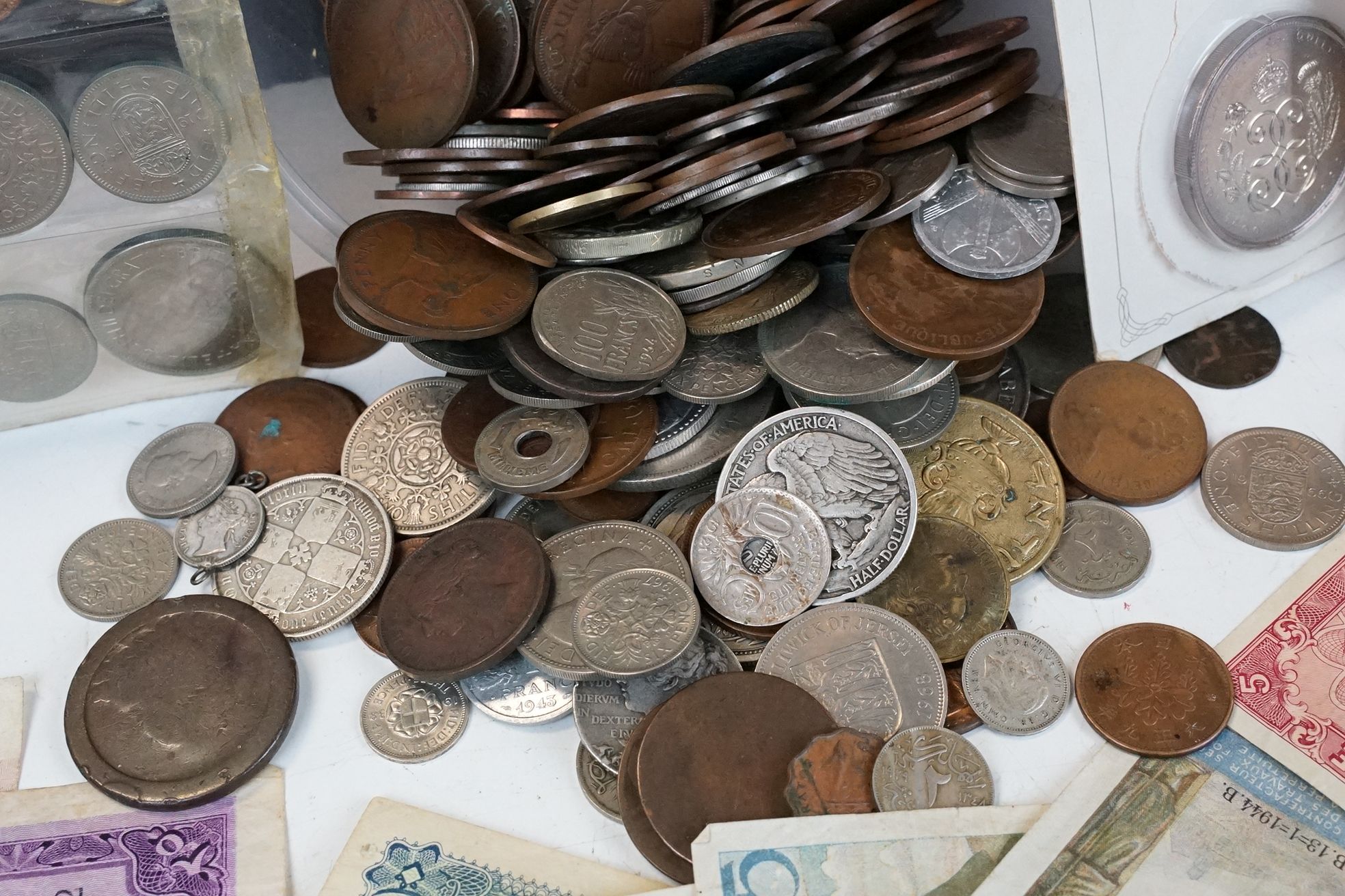 A small collection of British pre decimal and world coins to include silver examples together with a - Image 2 of 9