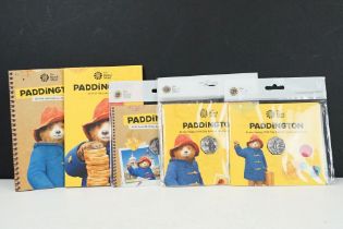 A collection of Royal Mint Paddington Bear coin sets to include 2018 and 2019 examples