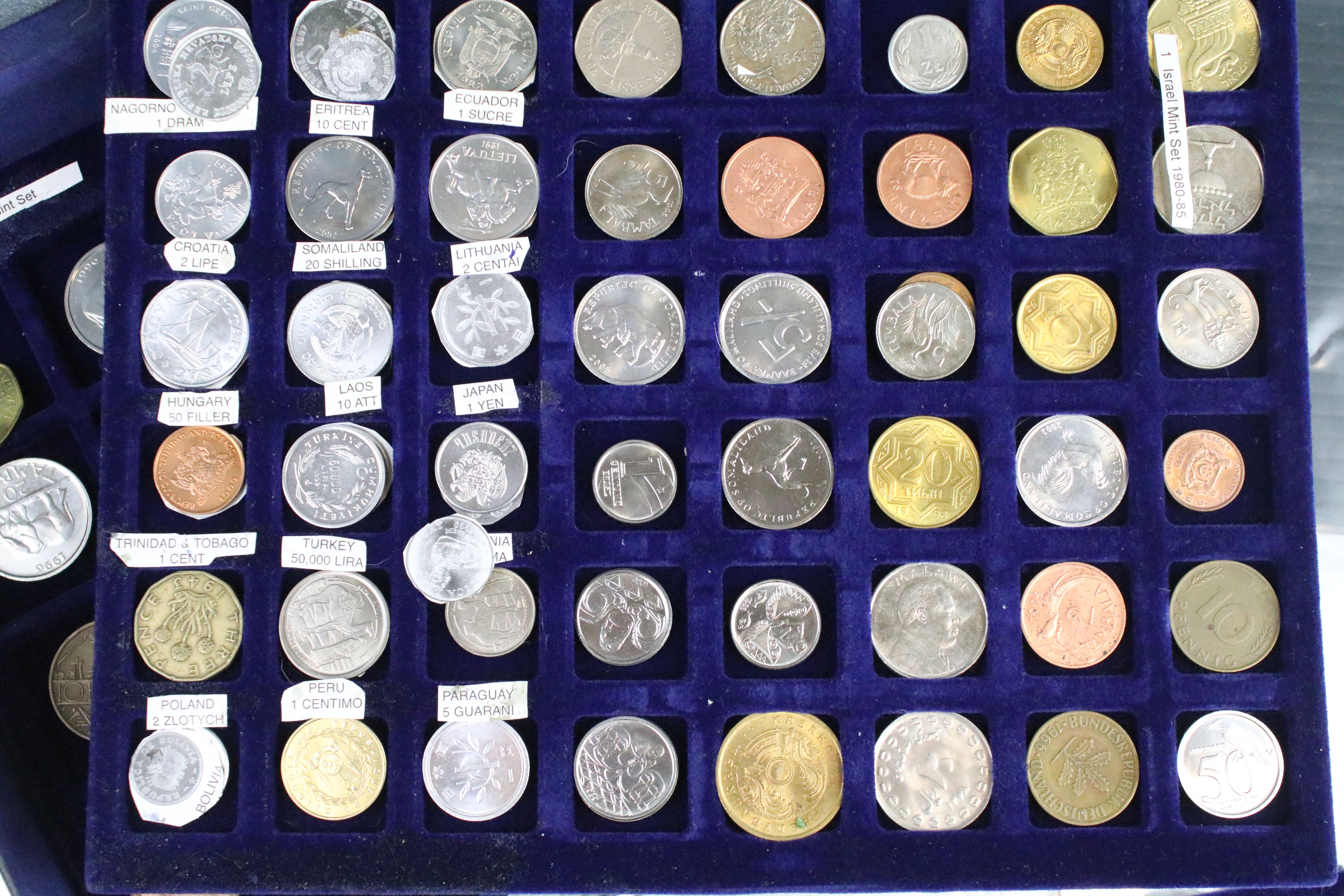 A collection of British pre decimal and World coins contained within an aluminium collectors case. - Image 10 of 11