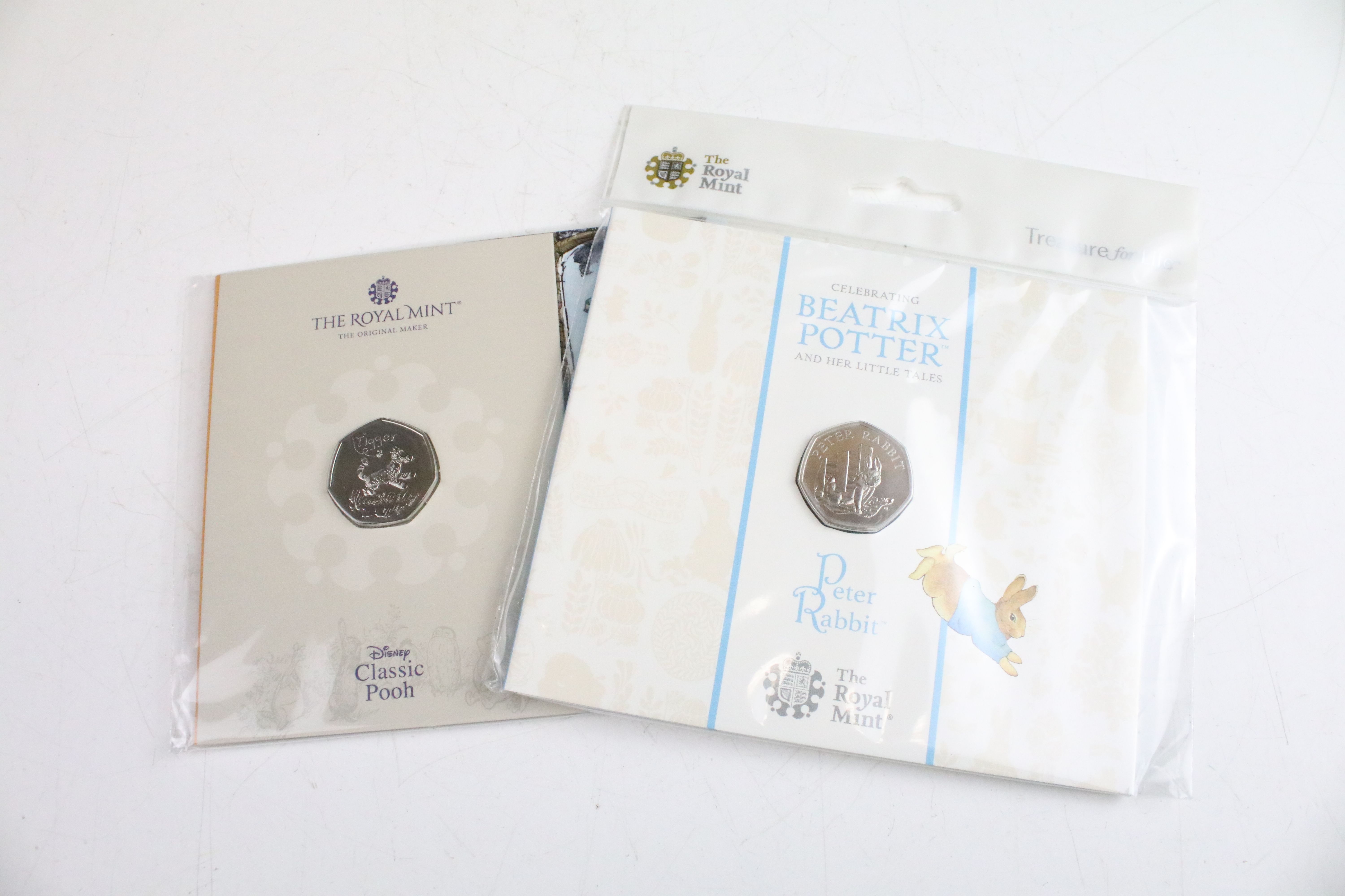 A collection of fifteen Royal Mint Beatrix Potter 50p coin collectors packs together with five - Bild 6 aus 8