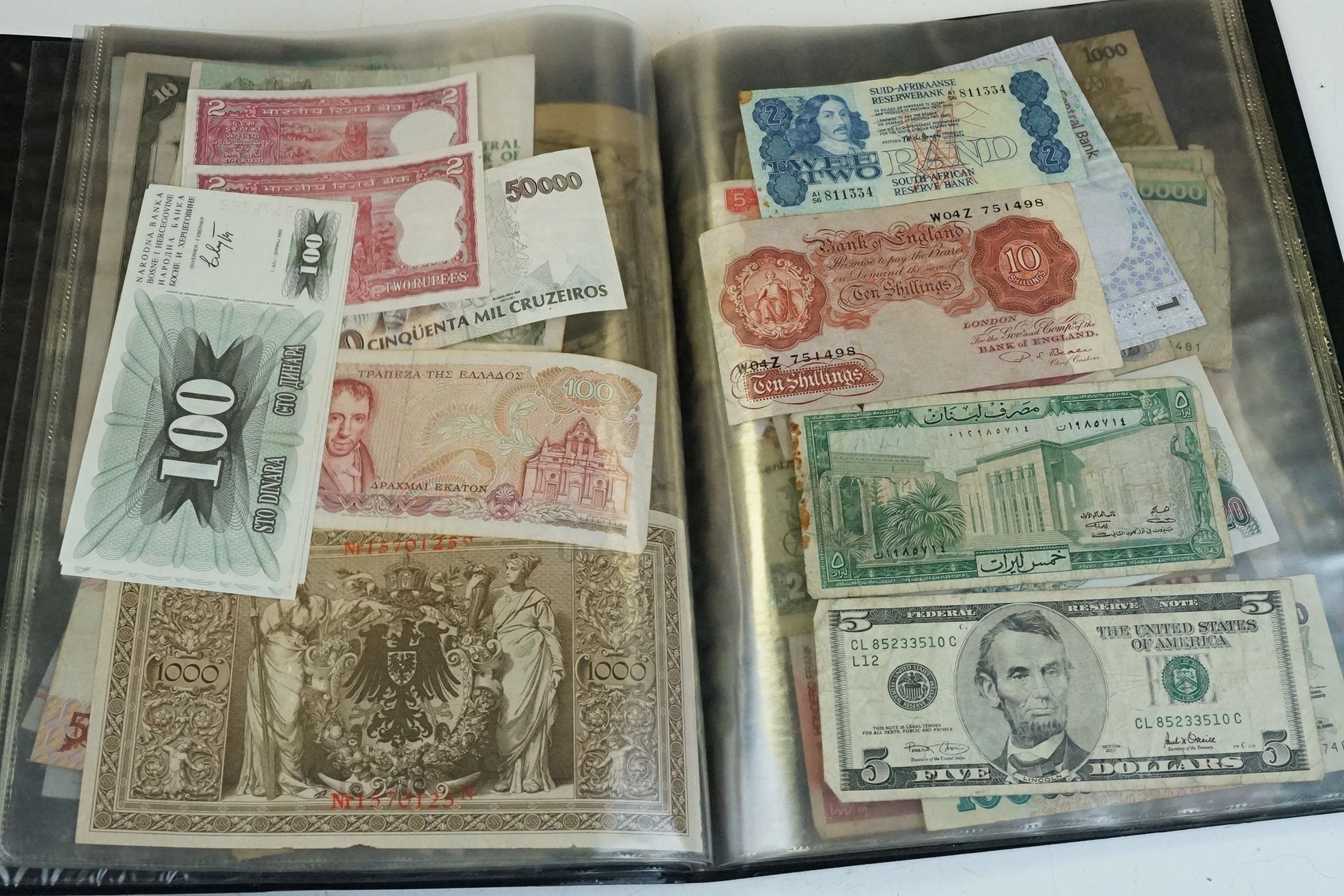 A collection of British and World banknotes contained within a folder to include China, Germany, - Image 11 of 19