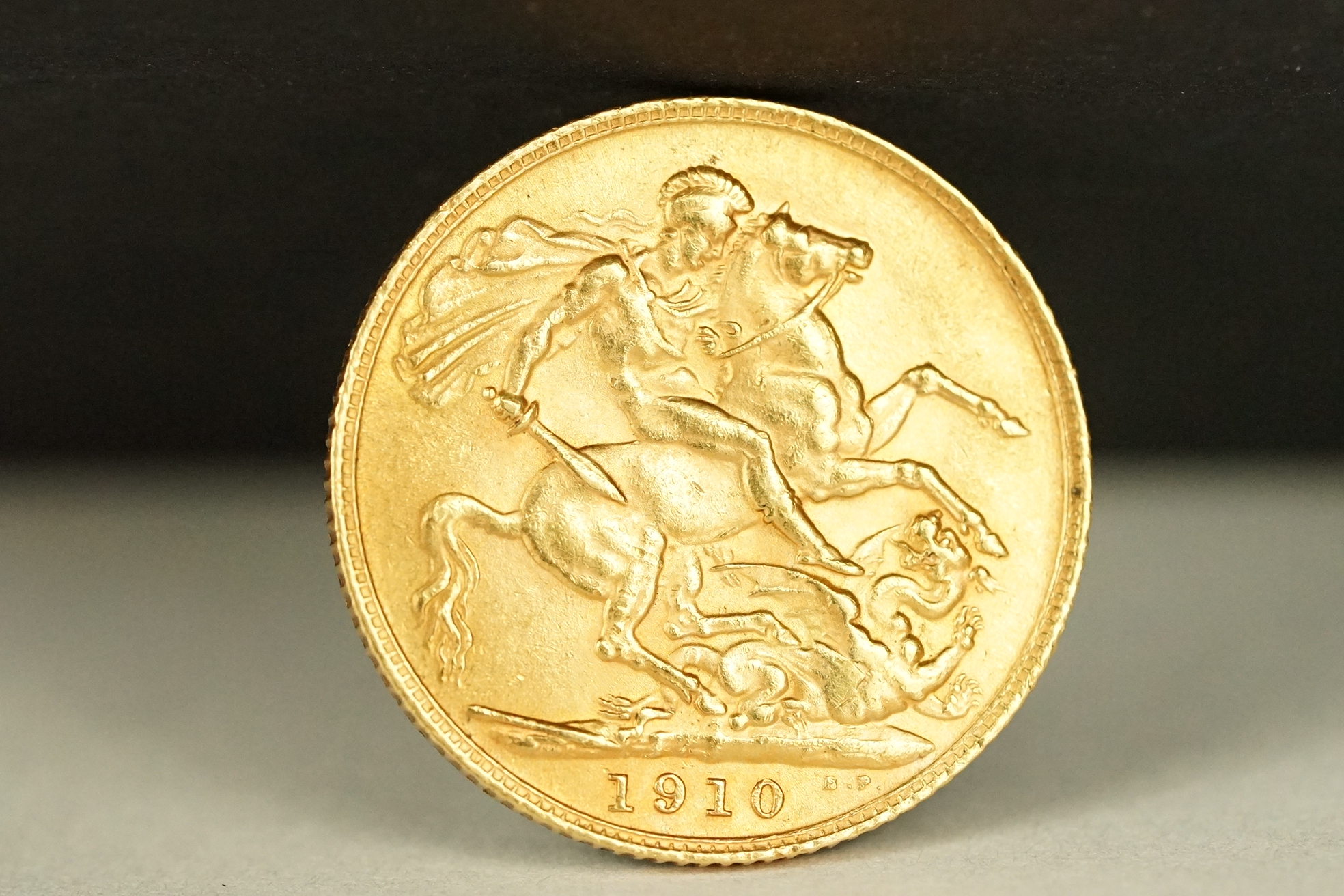 A British King Edward VII 1910 gold full sovereign coin.