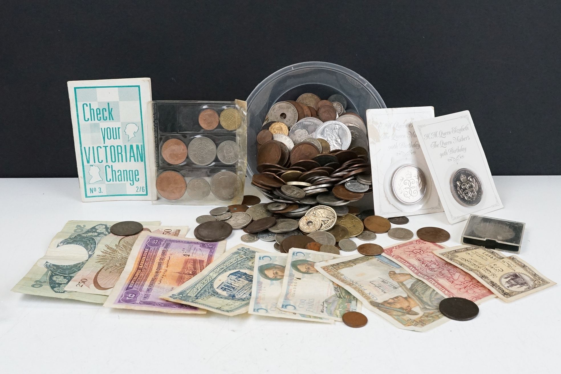 A small collection of British pre decimal and world coins to include silver examples together with a