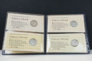 A set of four sterling silver Medallic first day coin covers within a fitted collectors album