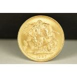 A British Queen Elizabeth II 1967 gold full sovereign coin.