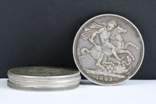 A collection of four British Queen Victoria pre decimal silver full crown coins to include 1889,