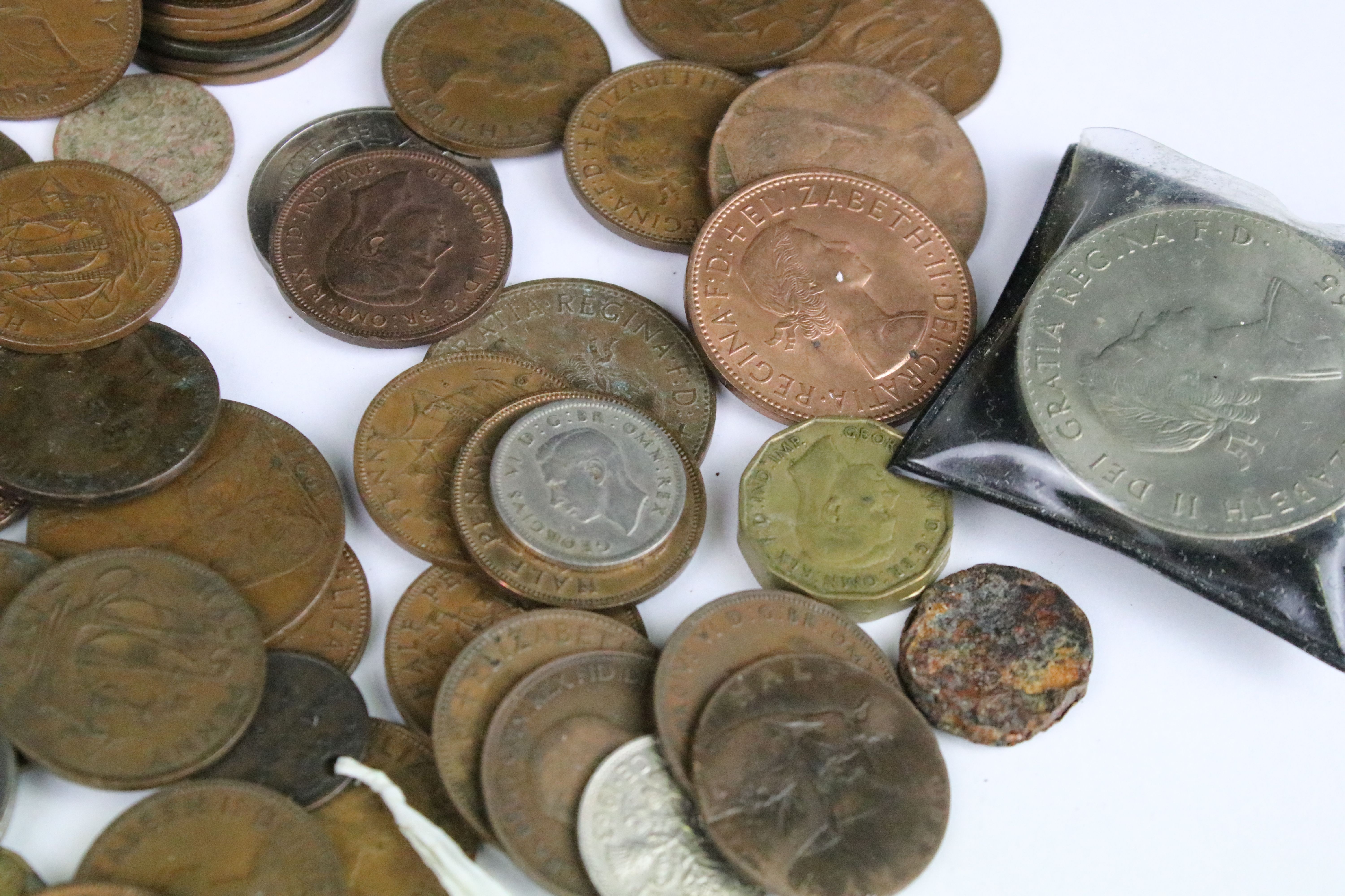 A small collection of British pre decimal coins to include silver crown and half crown examples. - Image 7 of 9