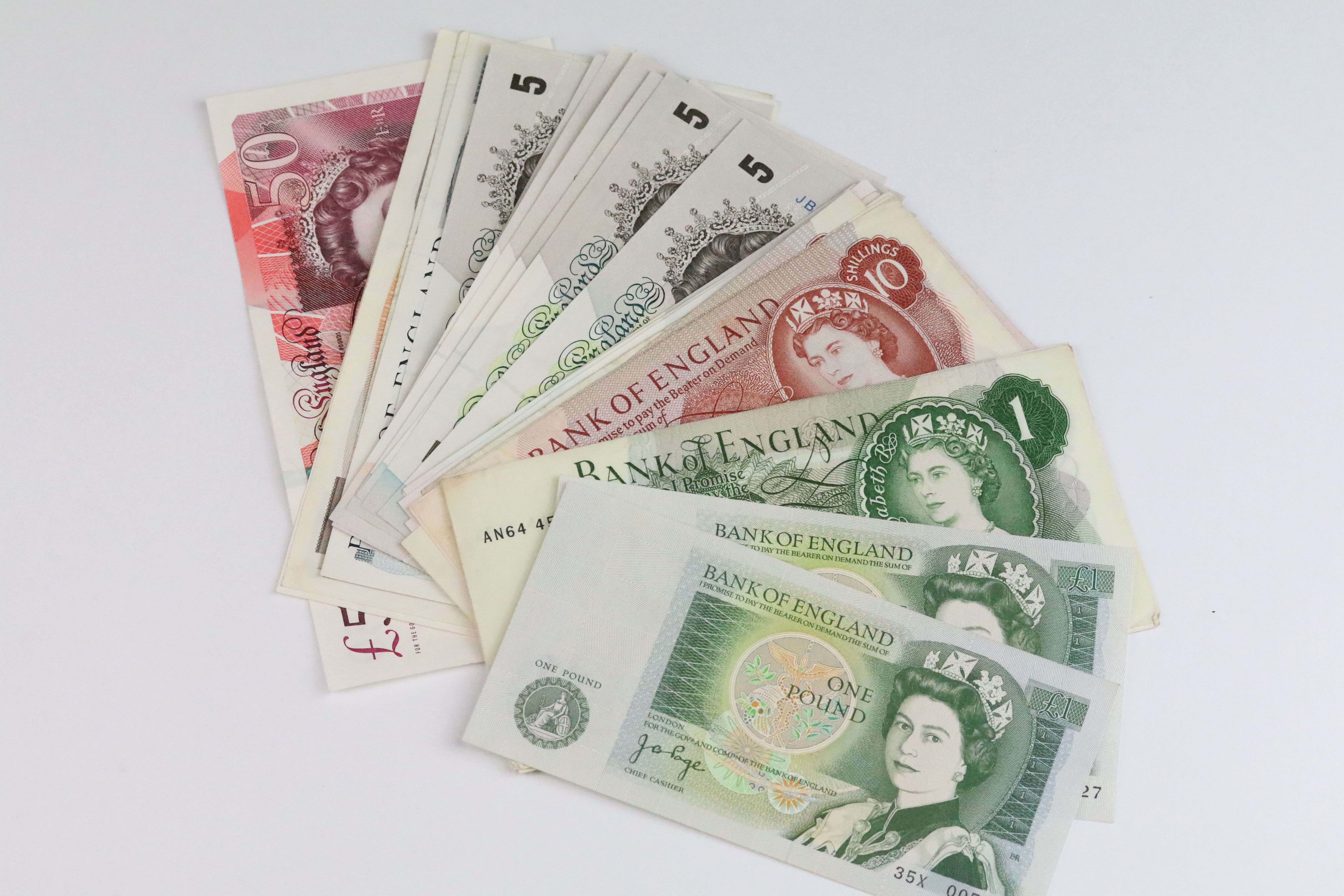 A collection of mixed British circulated and uncirculated banknotes with various chief cashiers to