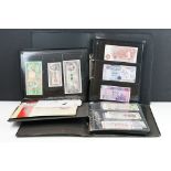 A large collection of British and World banknotes contained within three folders to include