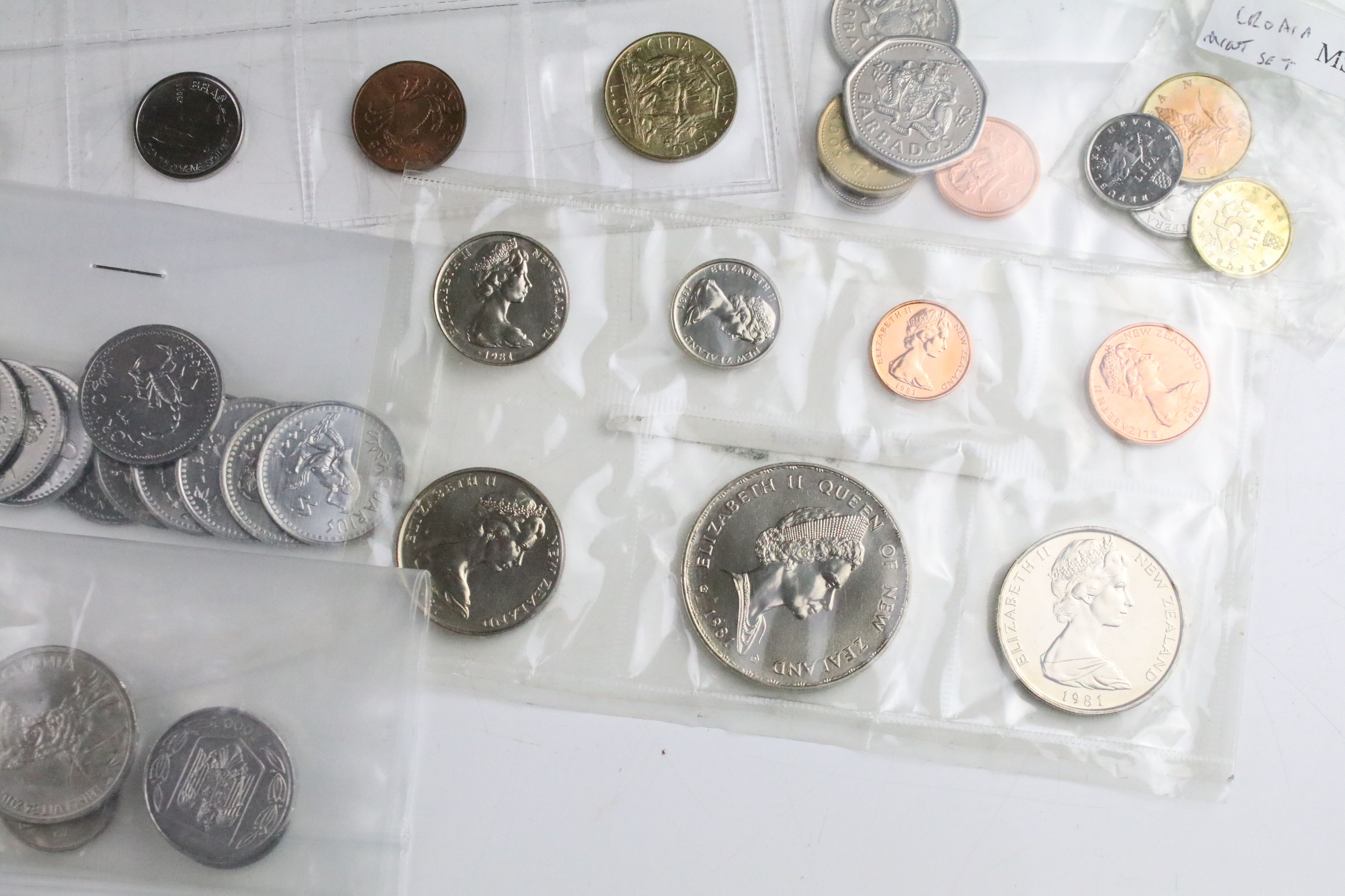 A collection of British pre decimal and World coins contained within an aluminium collectors case. - Image 5 of 11