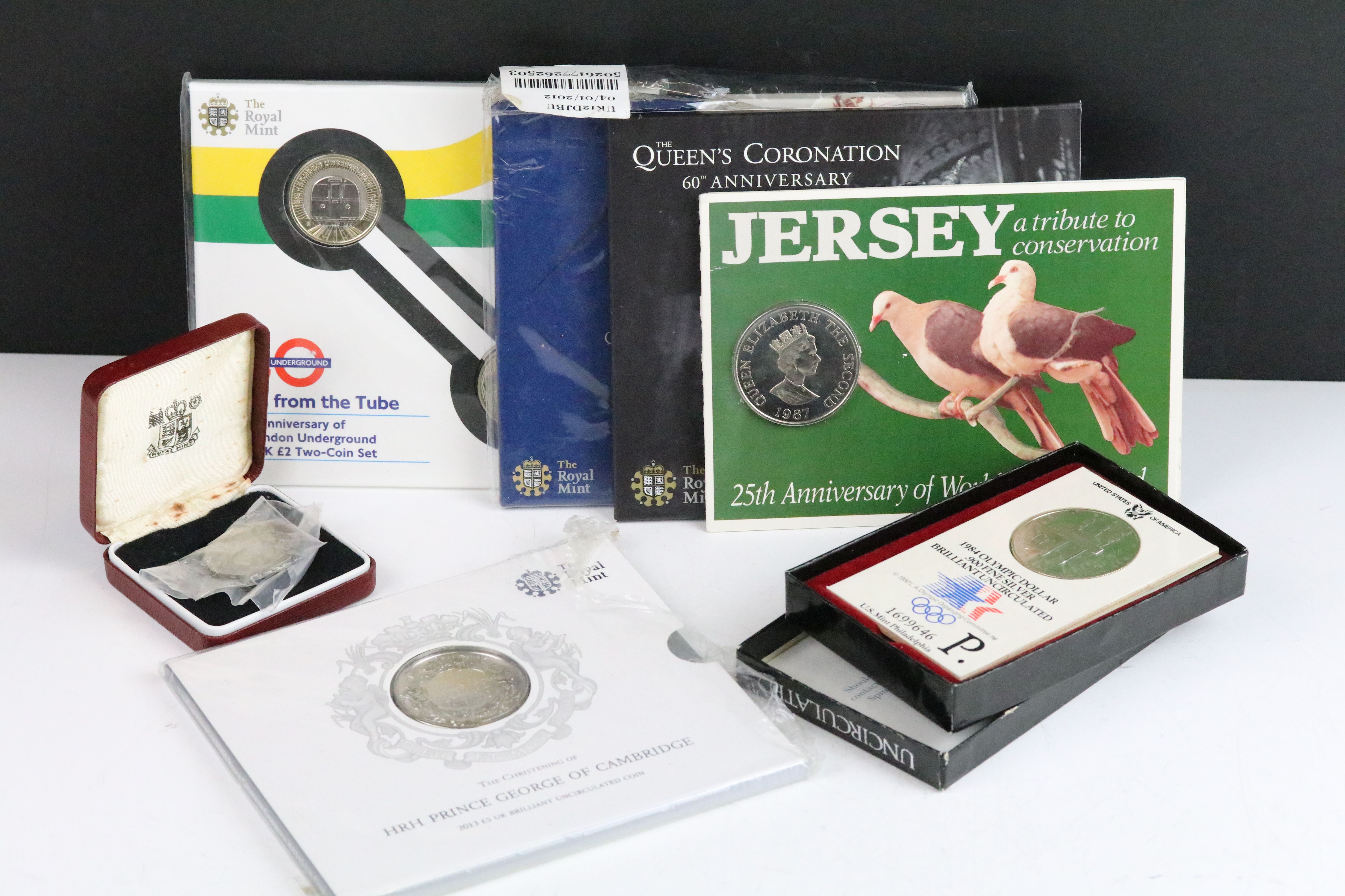 A small collection of Royal Mint brilliant uncirculated coin sets together with a United States of