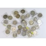 A collection of twenty nine British pre decimal silver half crown coins to include pre 1947 and