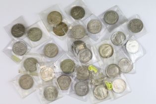 A collection of twenty nine British pre decimal silver half crown coins to include pre 1947 and