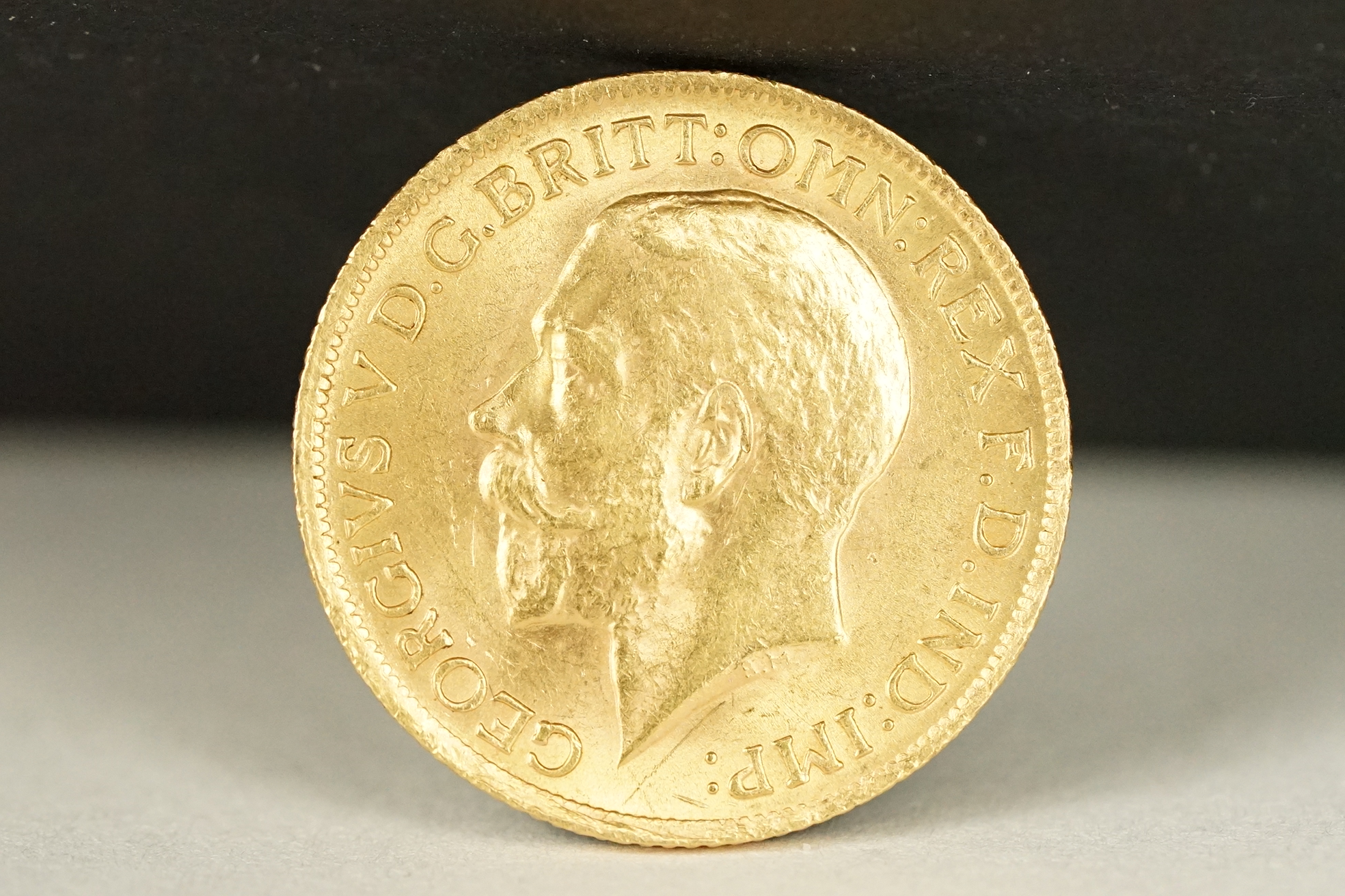 A British King George V 1914 gold full sovereign coin. - Image 2 of 3